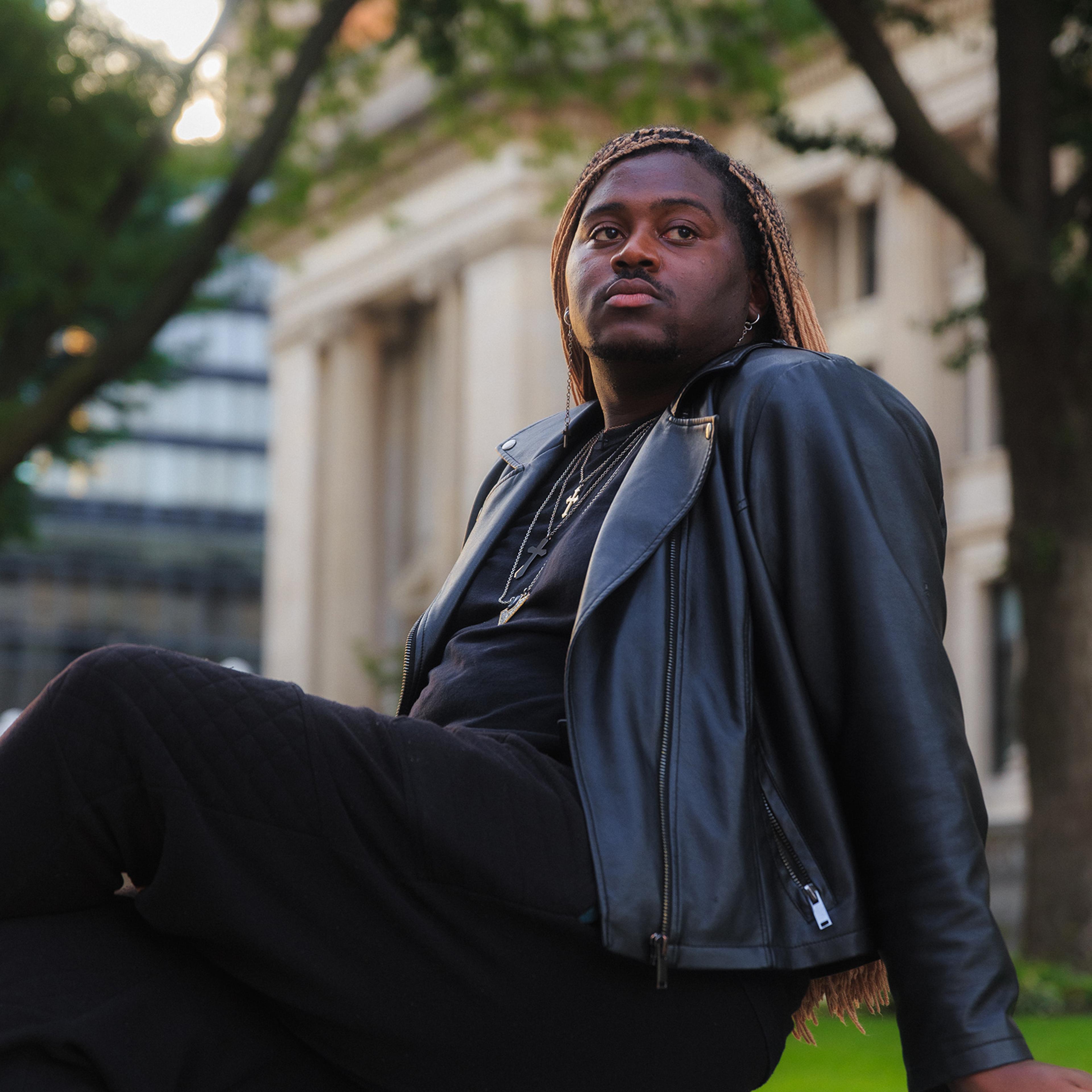 D’Angelo Sandidge sits in front of the U.S. District Courthouse in Indianapolis, near the site of his arrest on June 2.