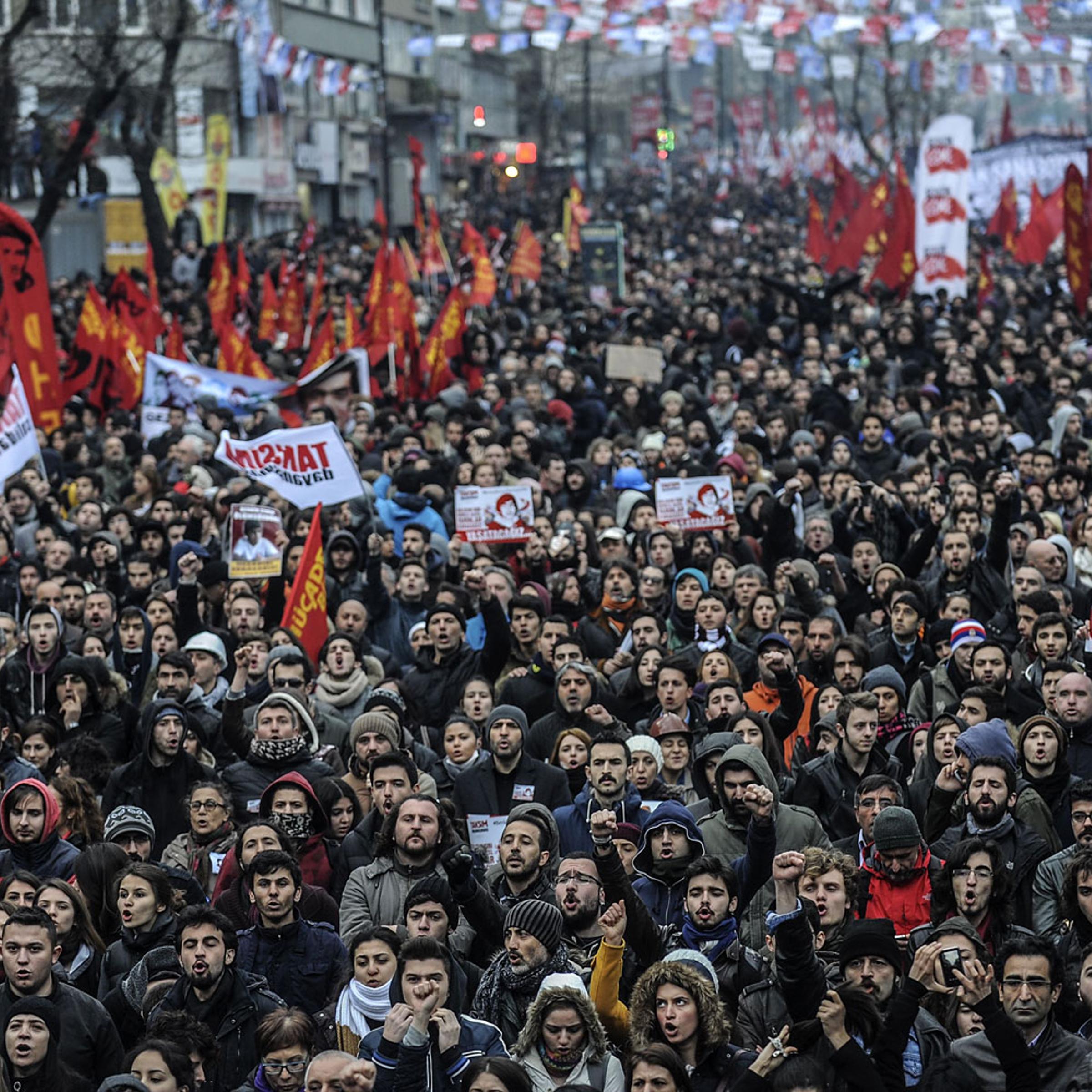 People gather for the funeral of Berkin Elvan, the 15-year-old boy who died from injuries suffered during last year's anti-government protests, in Istanbul on March 12, 2014.