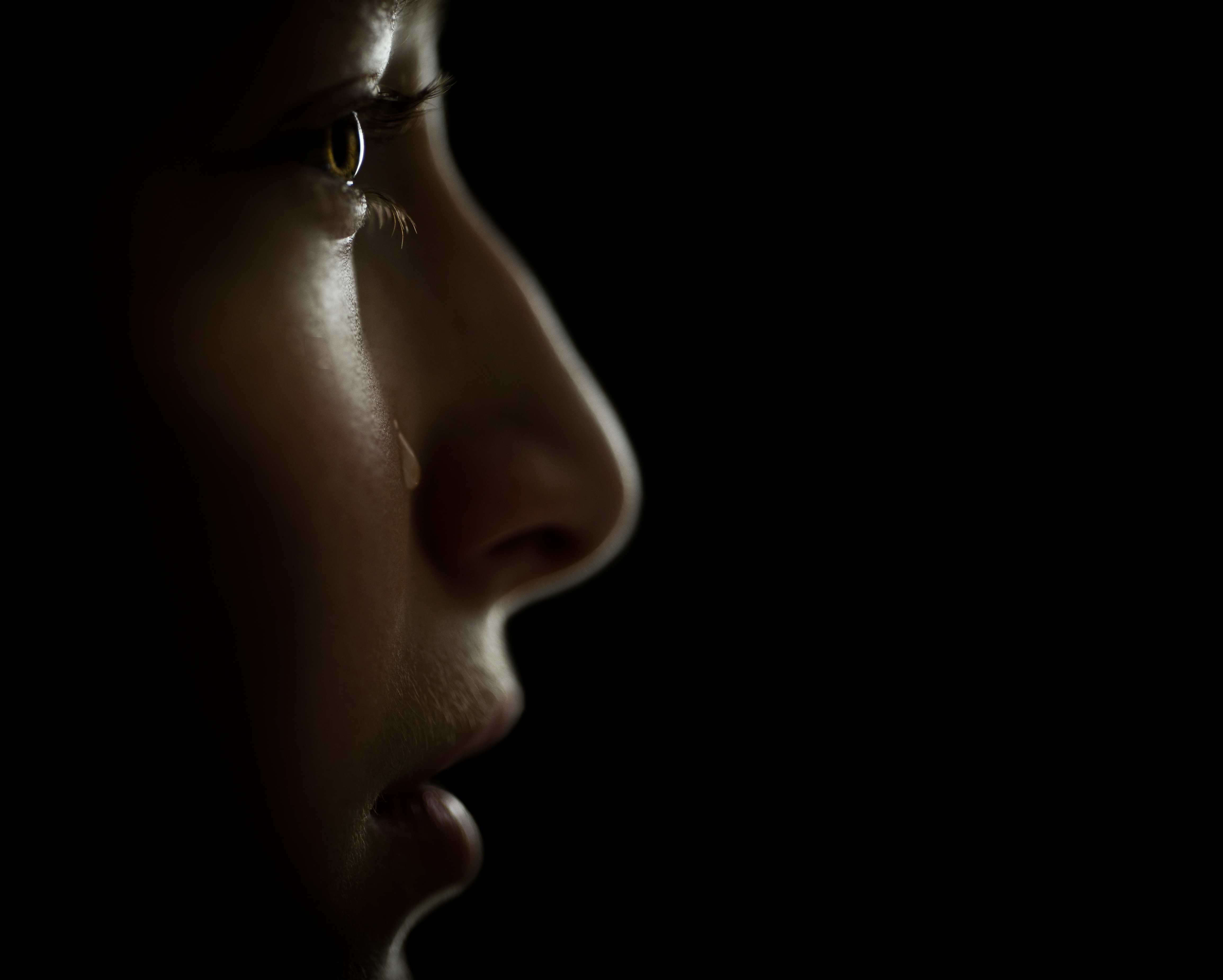Profile of boy crying