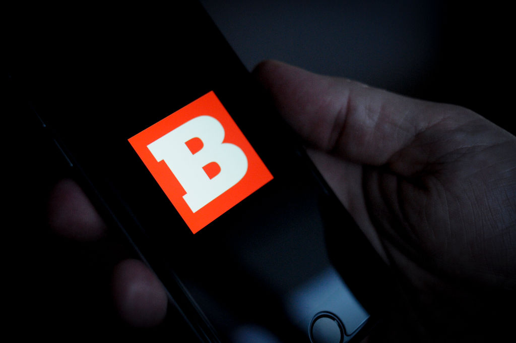 Breitbart logo shown on phone