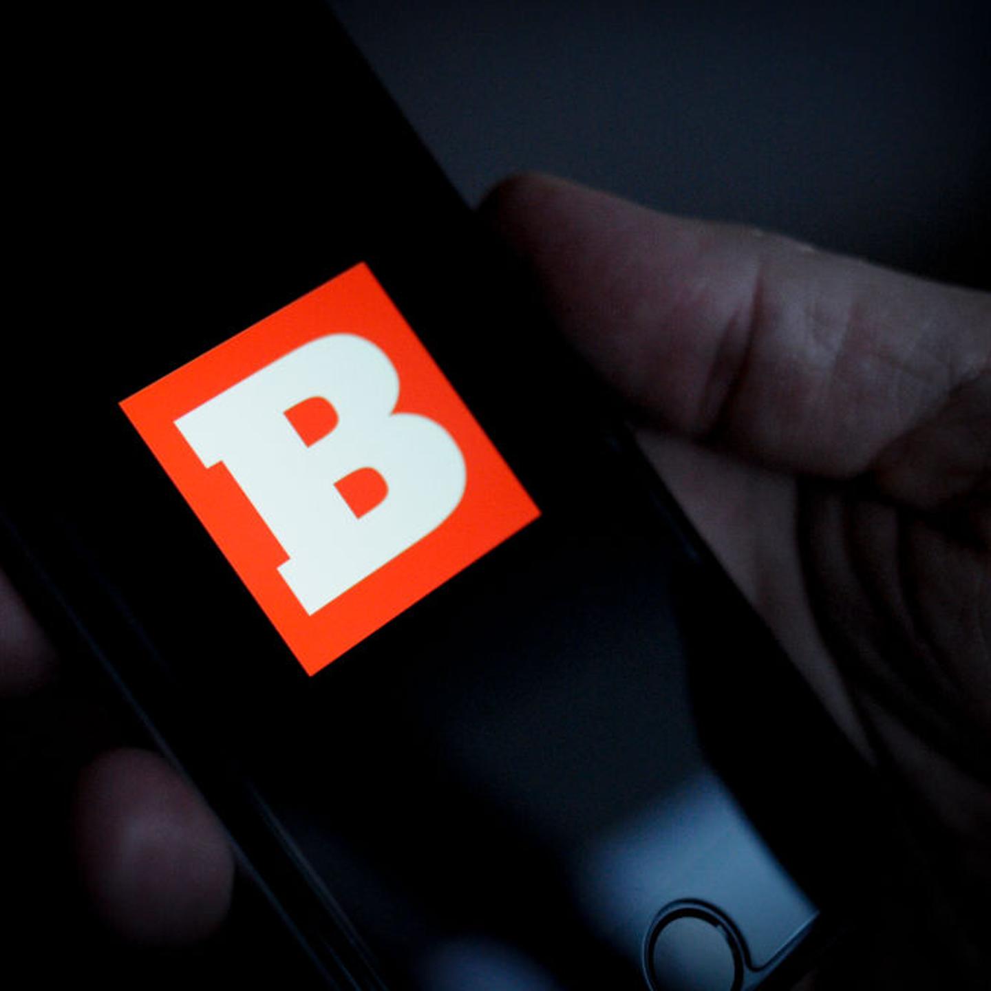 Breitbart logo shown on phone