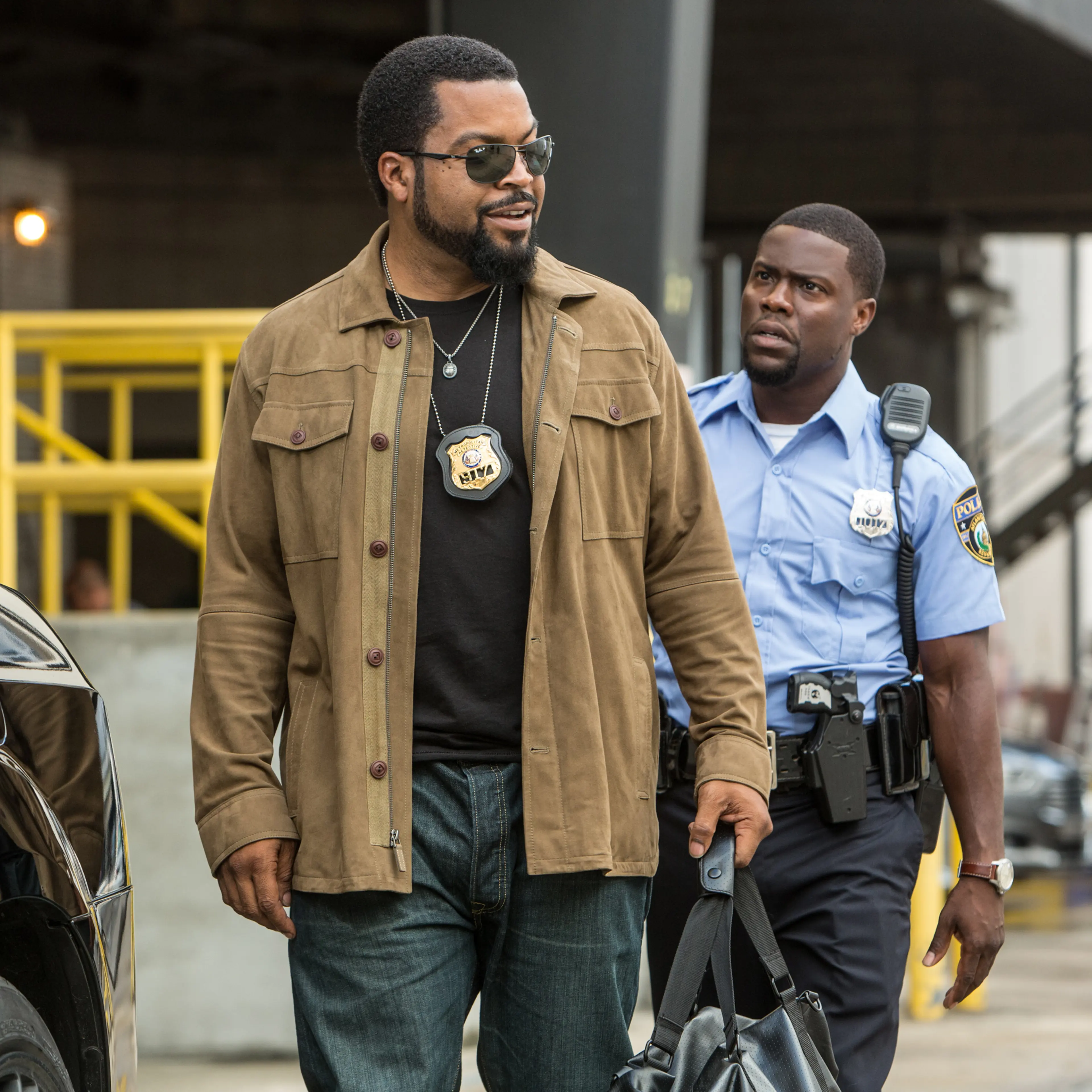 Ice Cube, left, as James Payton and Kevin Hart, right, as Ben Barber in a scene from Ride Along 2.