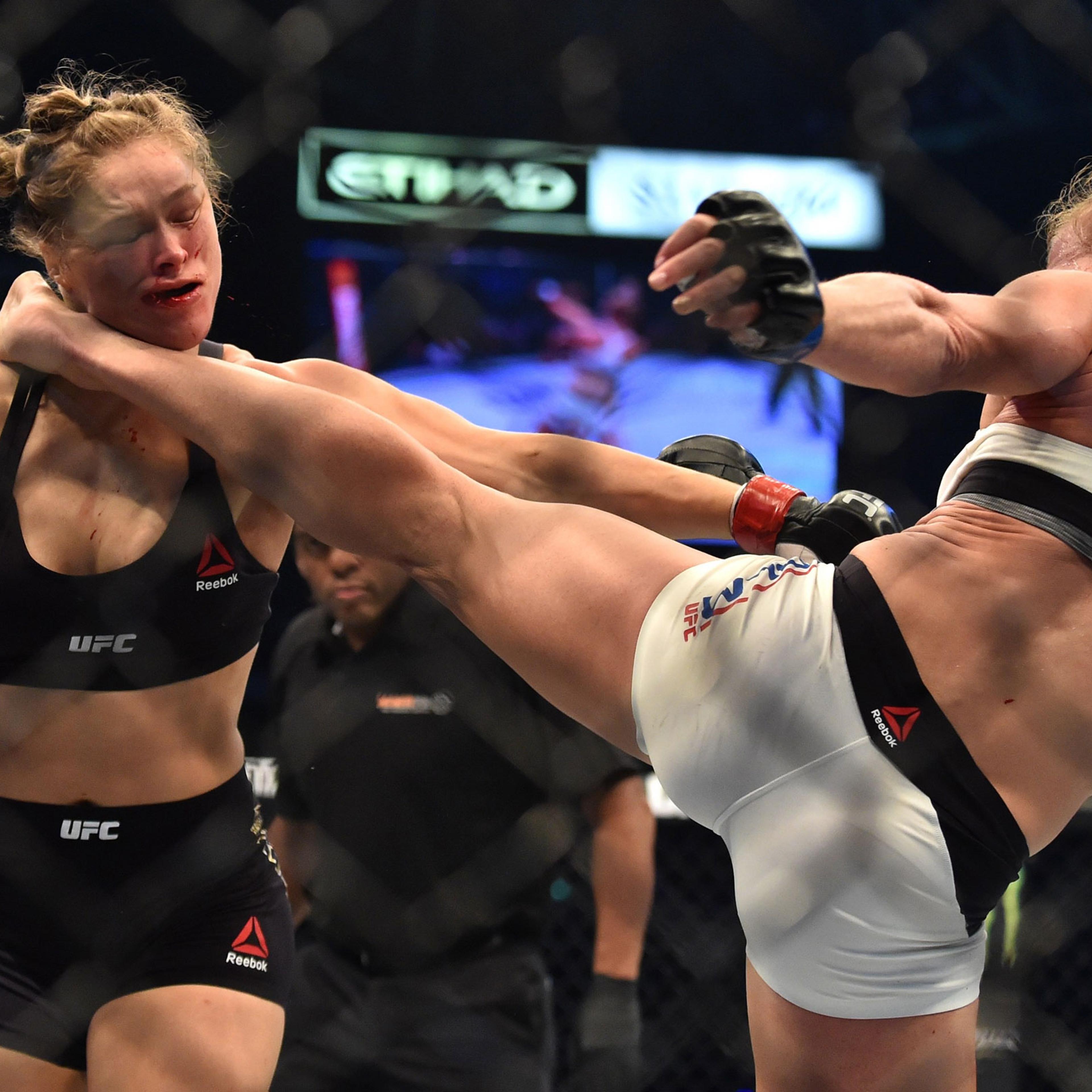 Holly Holm of the U.S. (pictured right) lands a kick to the neck to knock out compatriot Ronda Rousey and wins the Ultimate Fighting Championship (UFC) title fight in Melbourne, Australia. Nov. 15, 2015.