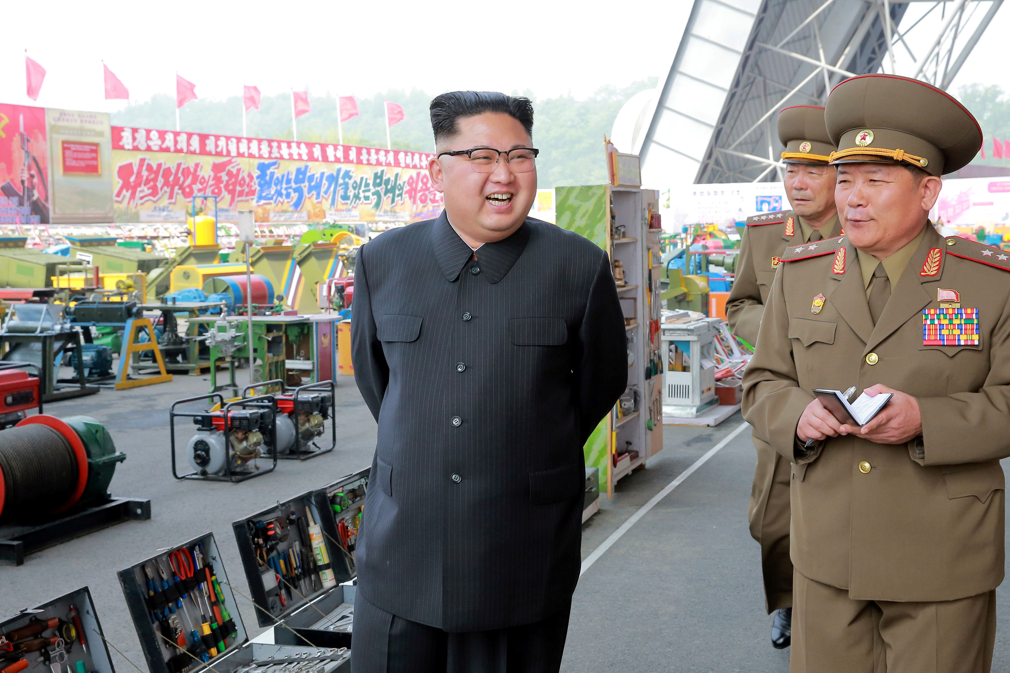 North Korean leader Kim Jong Un visits the exhibition of utensils and tools, finishing building materials and sci-tech achievements organised by the Ministry of the People's Armed Forces