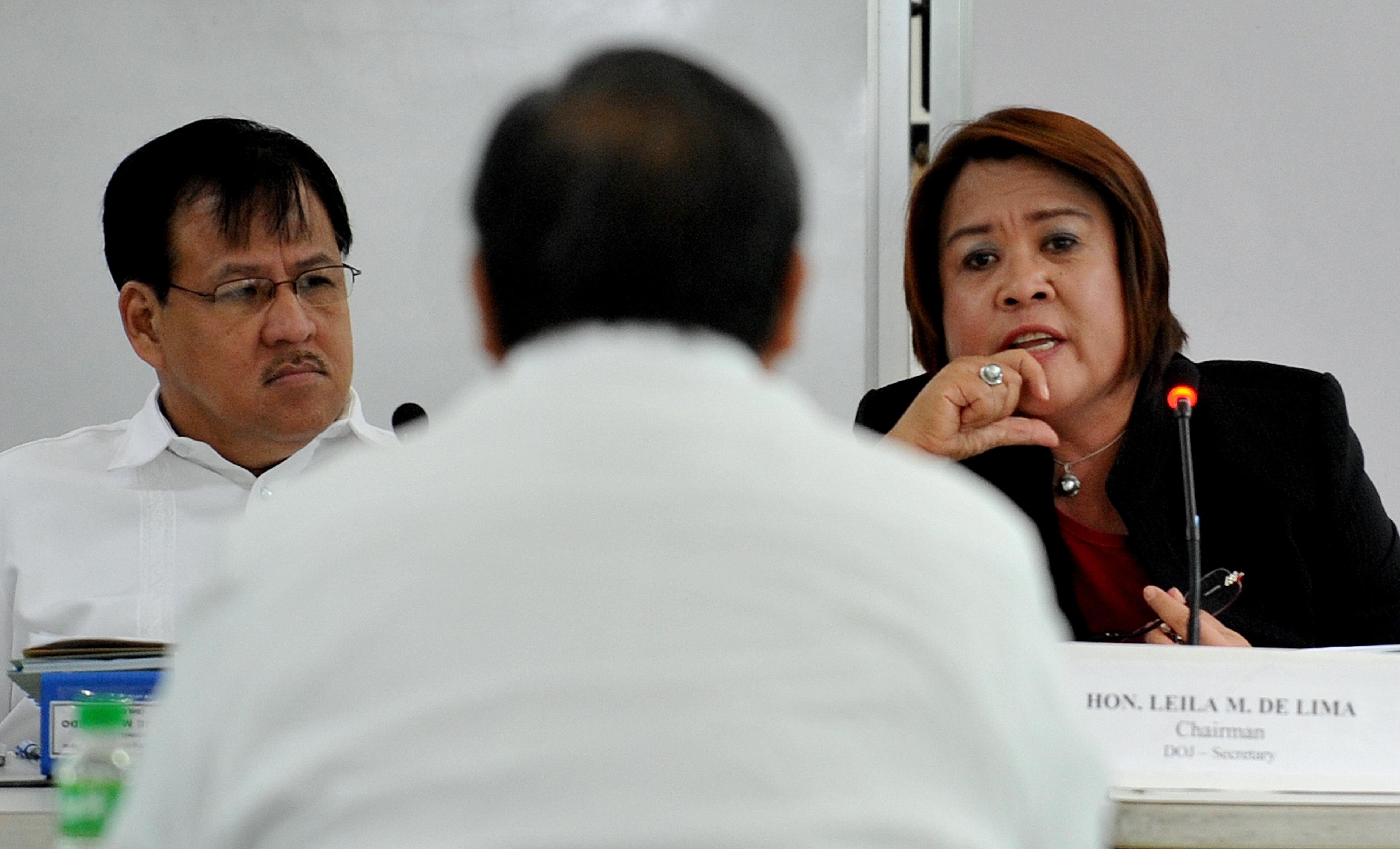 Justice Secretary Leila de Lima (R), the