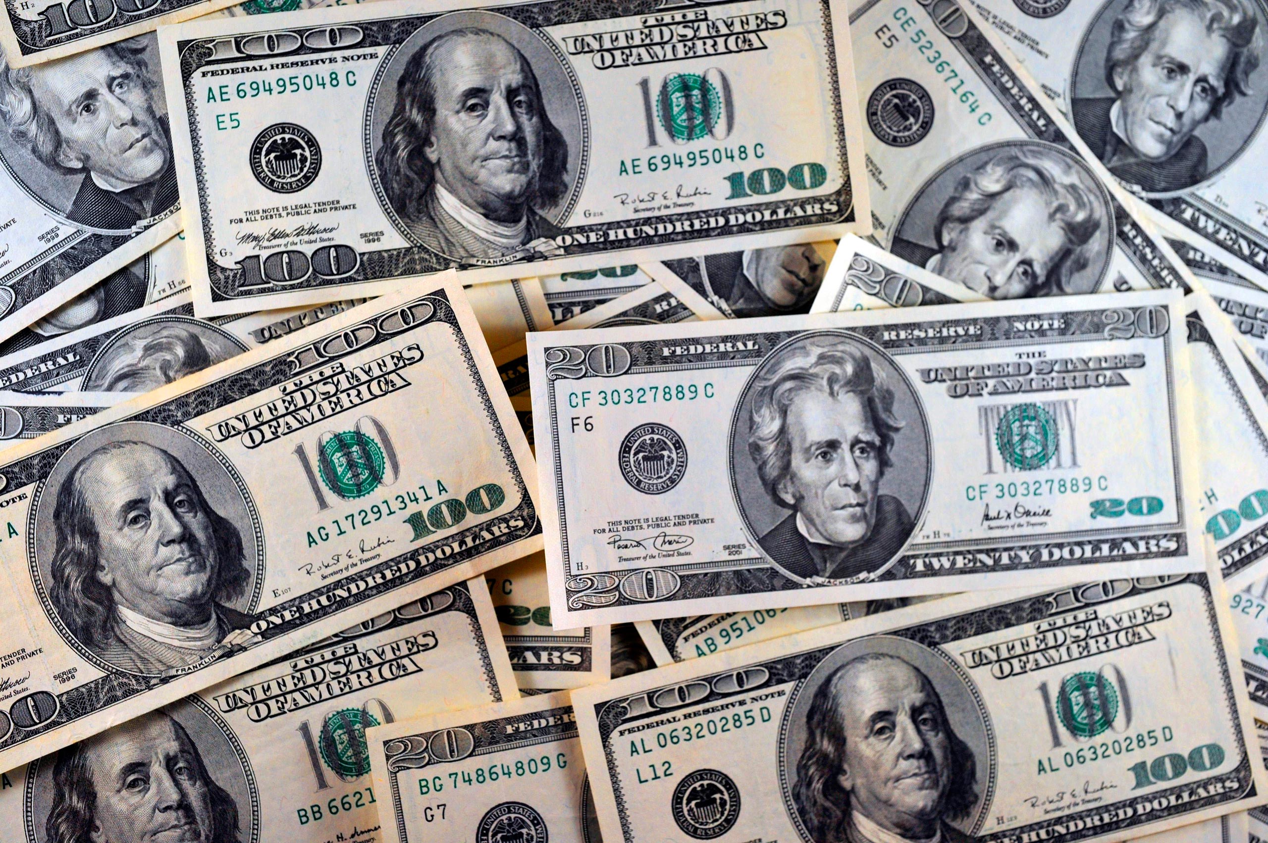 This file photo taken on January 30, 2011, shows U.S. currency in Manassas, Va.