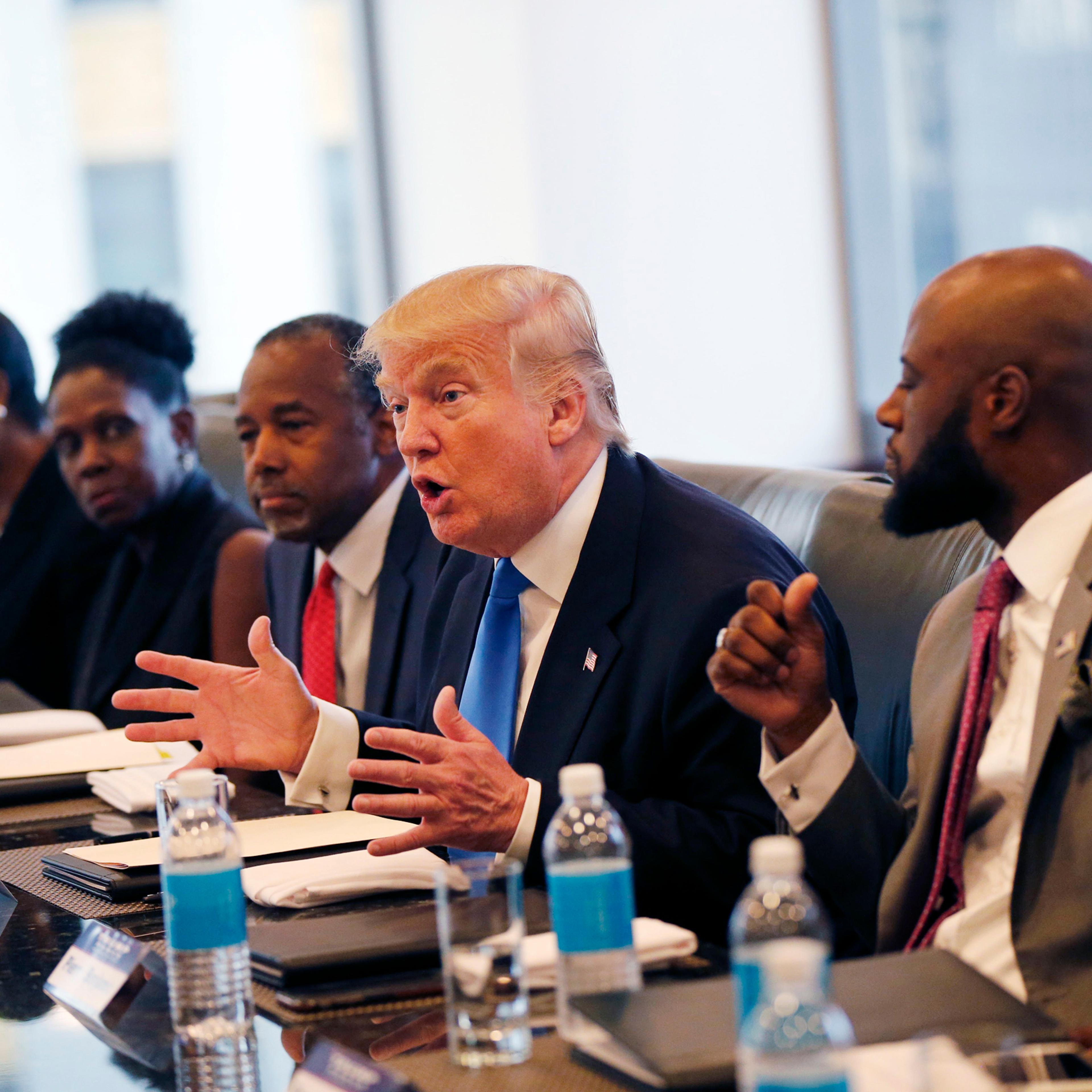 Republican presidential candidate Donald Trump holds a roundtable meeting with the Republican Leadership Initiative in his offices at Trump Tower in New York City on Aug. 25, 2016. Dr. Ben Carson is seated next to Trump at center.
