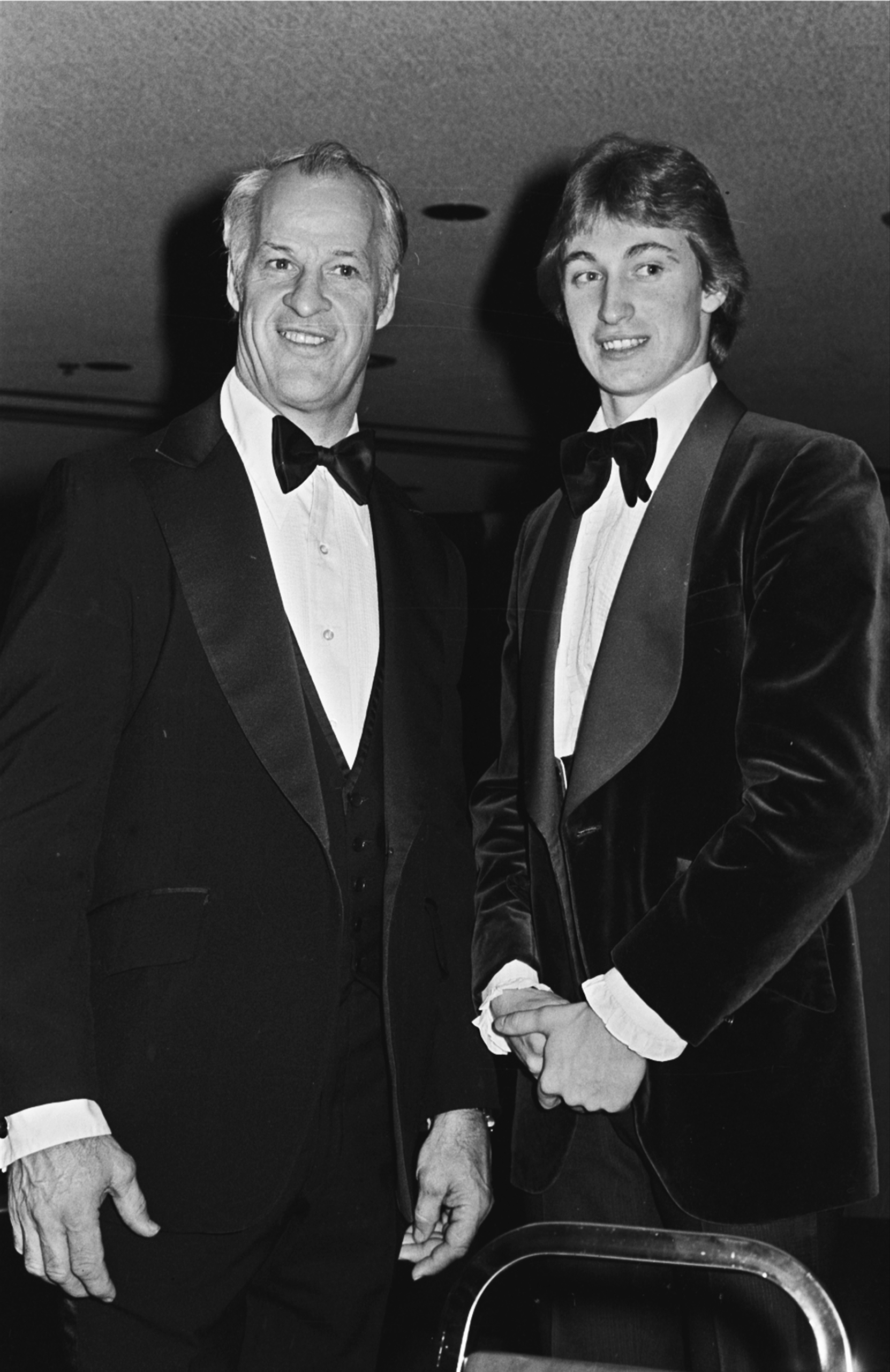 Gordie Howe, left, of the Hartford Whalers, and Wayne Gretzky of the Edmonton Oilers, pose for photographers at the NHL All-Star benefit dinner in Detroit, Feb. 5, 1980. Howe, 51, will play for the Prince of Wales Conference , and Gretzky, 19, will play 