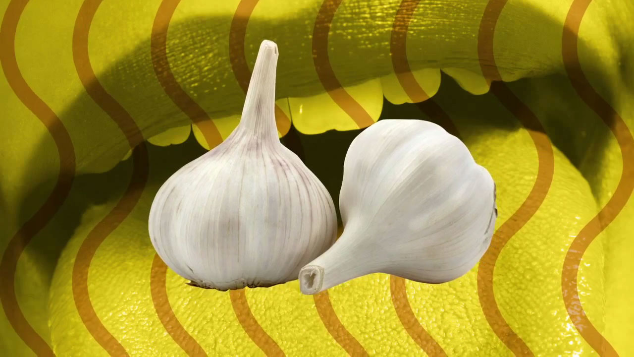 A complex group of volatile organic compounds give you that distinct garlic breath. 