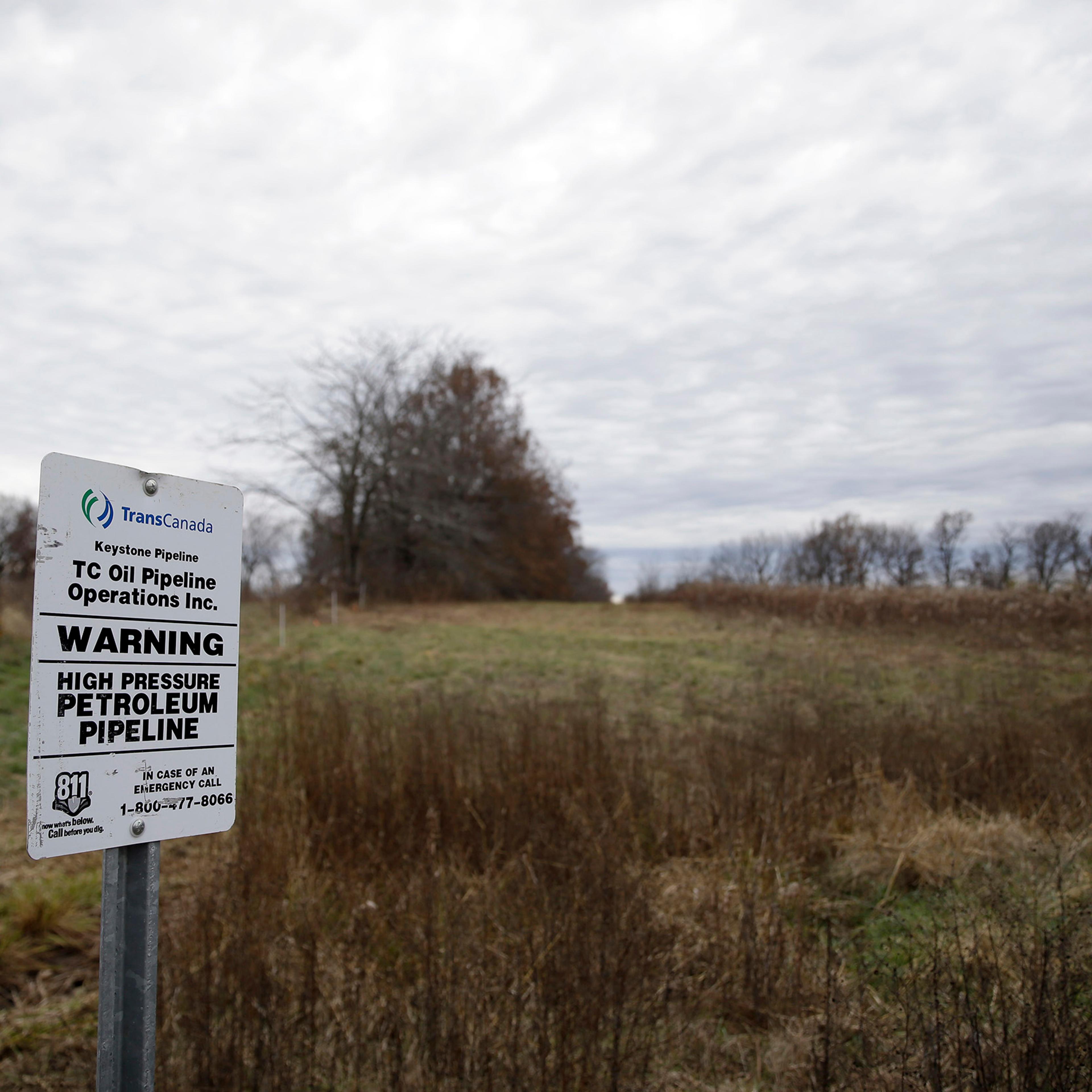 A sign marking the location of the TransCanada Keystone underground oil pipeline in Moberly, Mo, on Nov. 20, 2015.