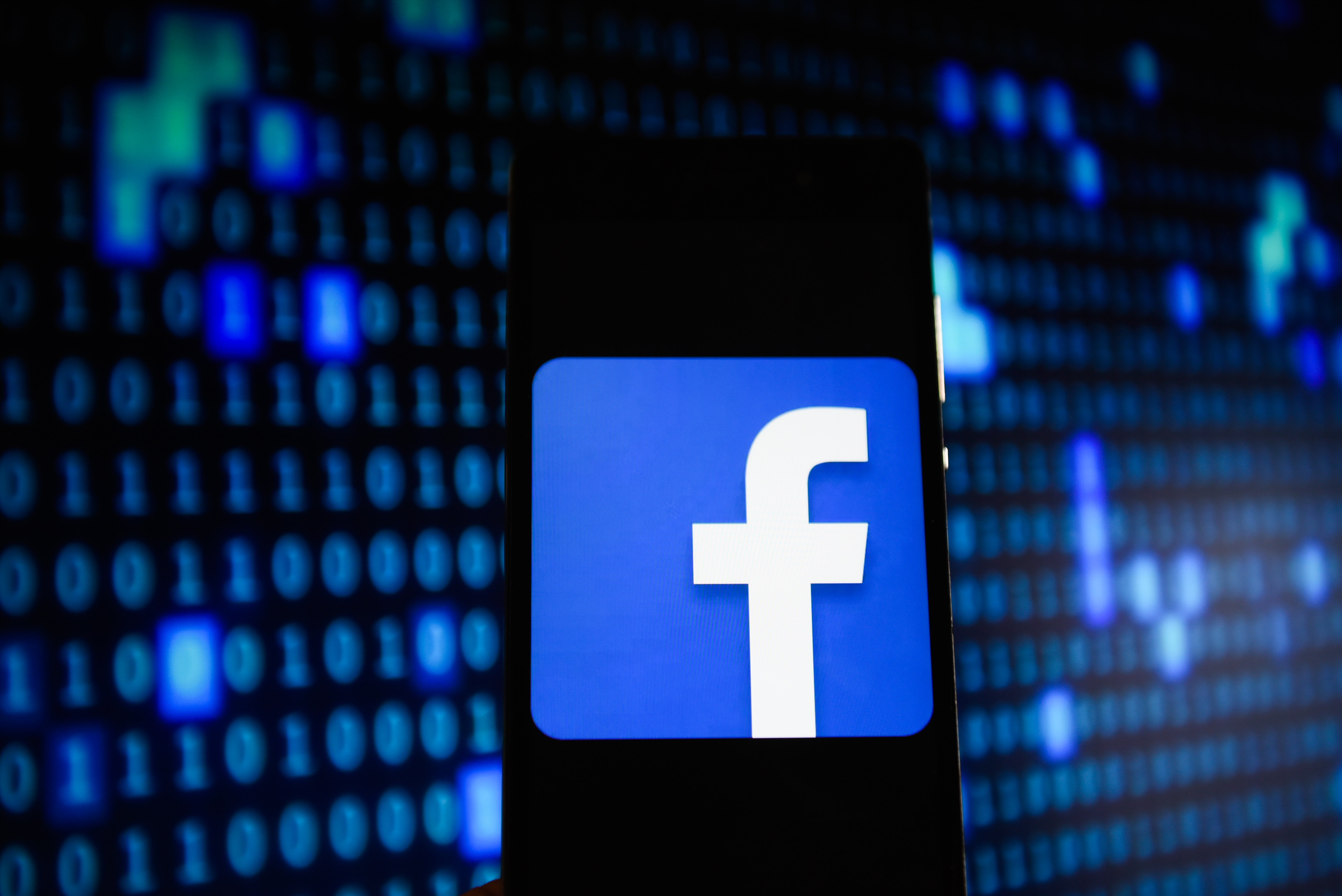 Facebook logo is seen on an Android mobile device