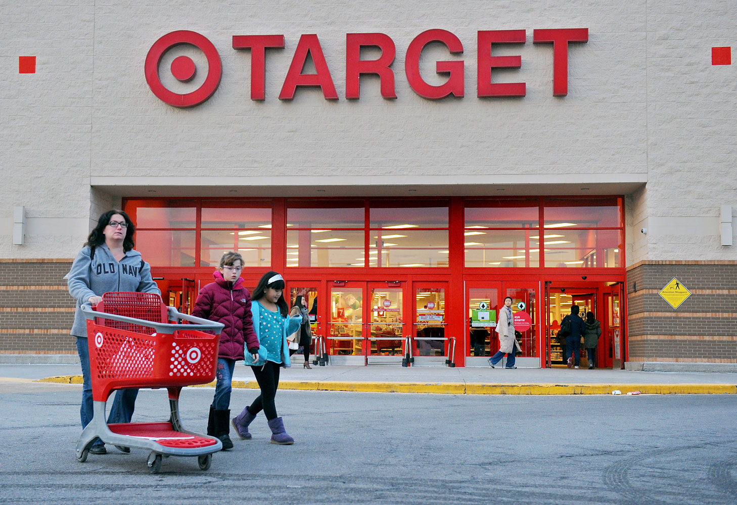 Shoppers leave a retail Target on Thursday, Dec. 19, 2013, in Hackensack, N.J.