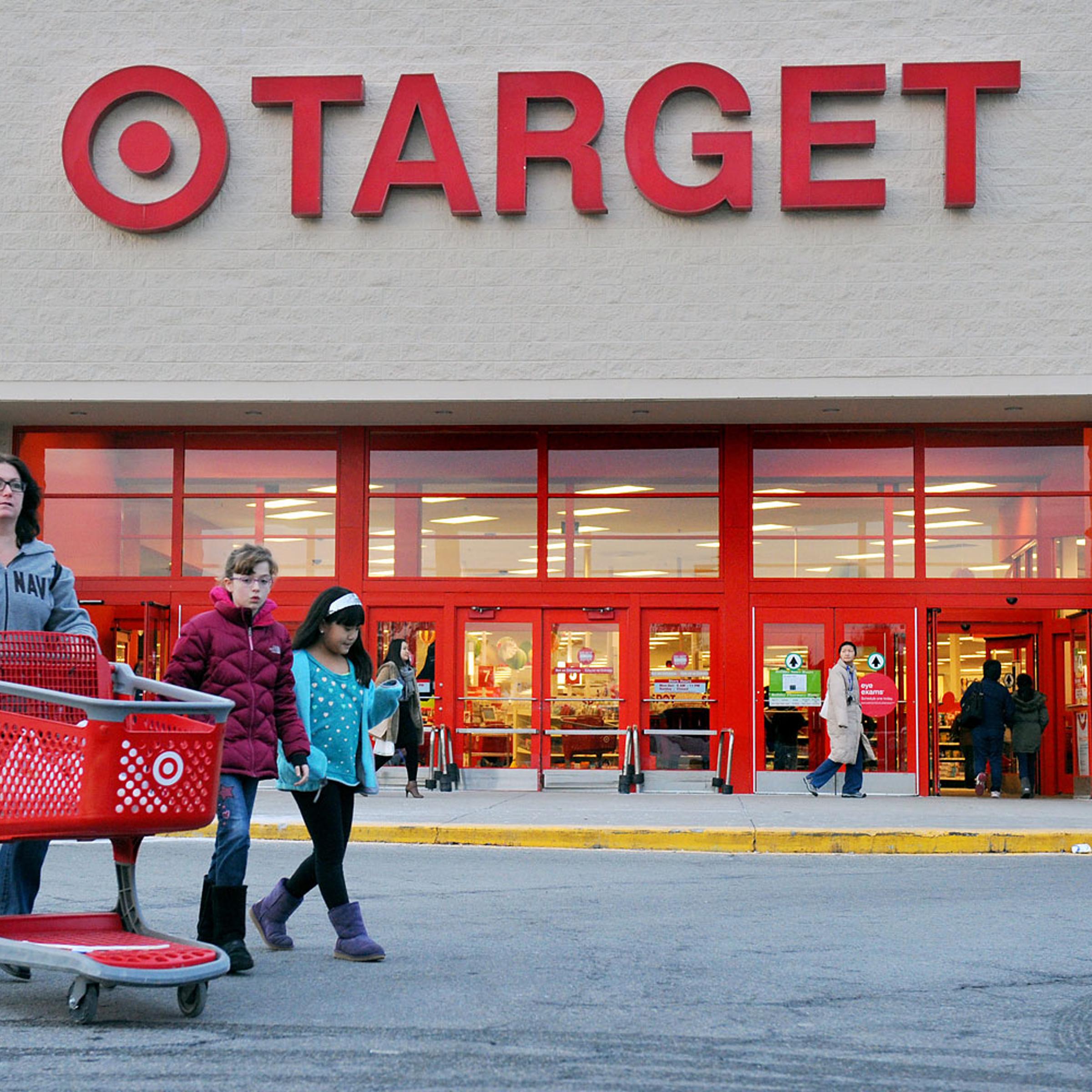 Shoppers leave a retail Target on Thursday, Dec. 19, 2013, in Hackensack, N.J.