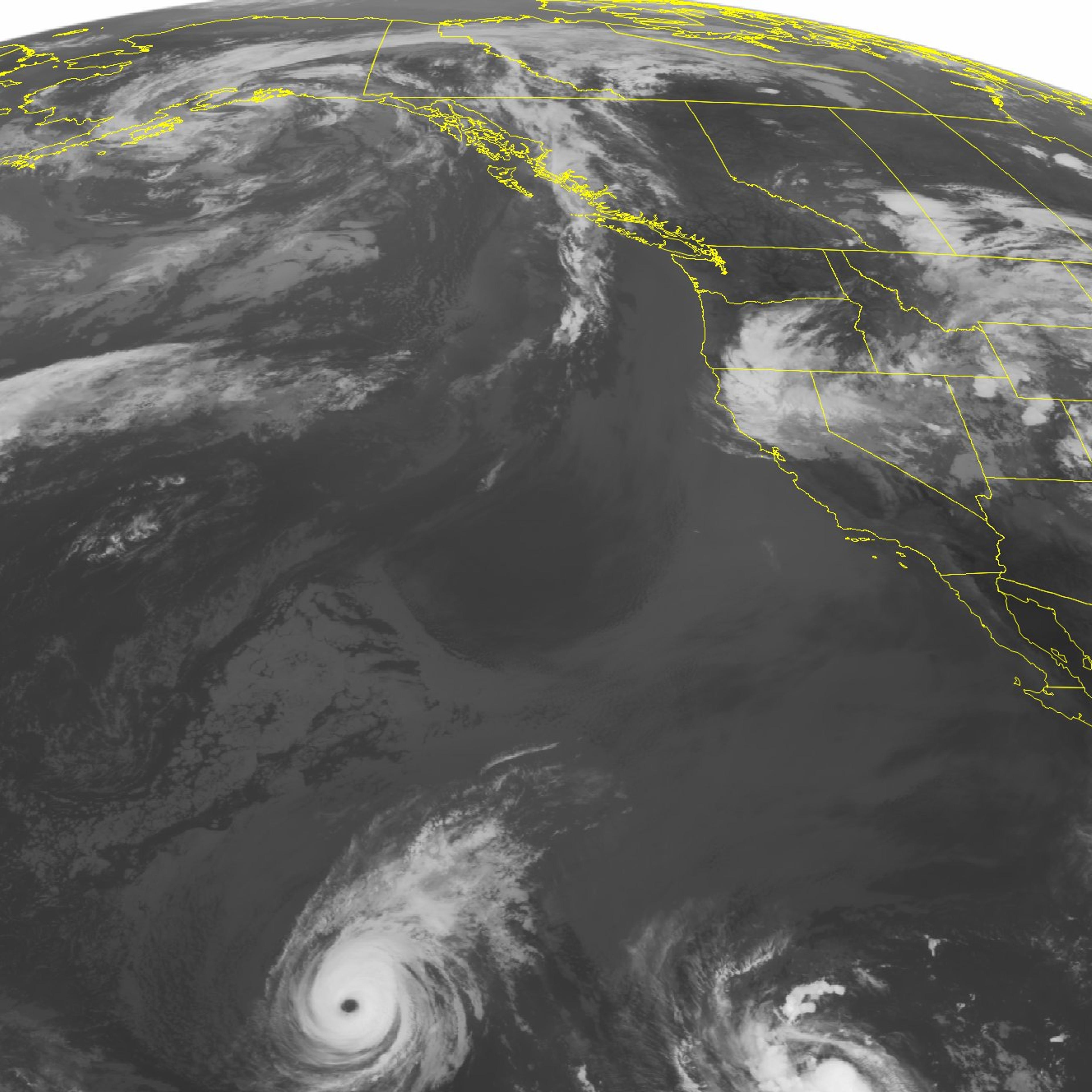 Hurricane Iselle is shown far to the east of Hawaii followed by Tropical Storm Julio on Aug. 5, 2014 in this NOAA satellite image.