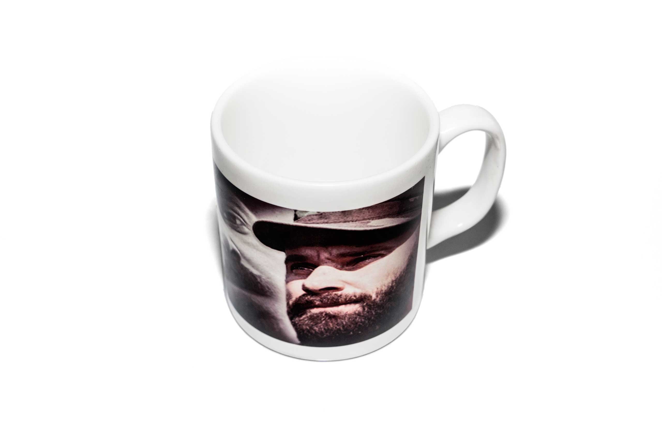 Items of clothing and objects found in a Islamic clothing and accessory shop in the Bagicilar district of Istanbul. A western style tea mug with a millitant commaners portrait on the side.