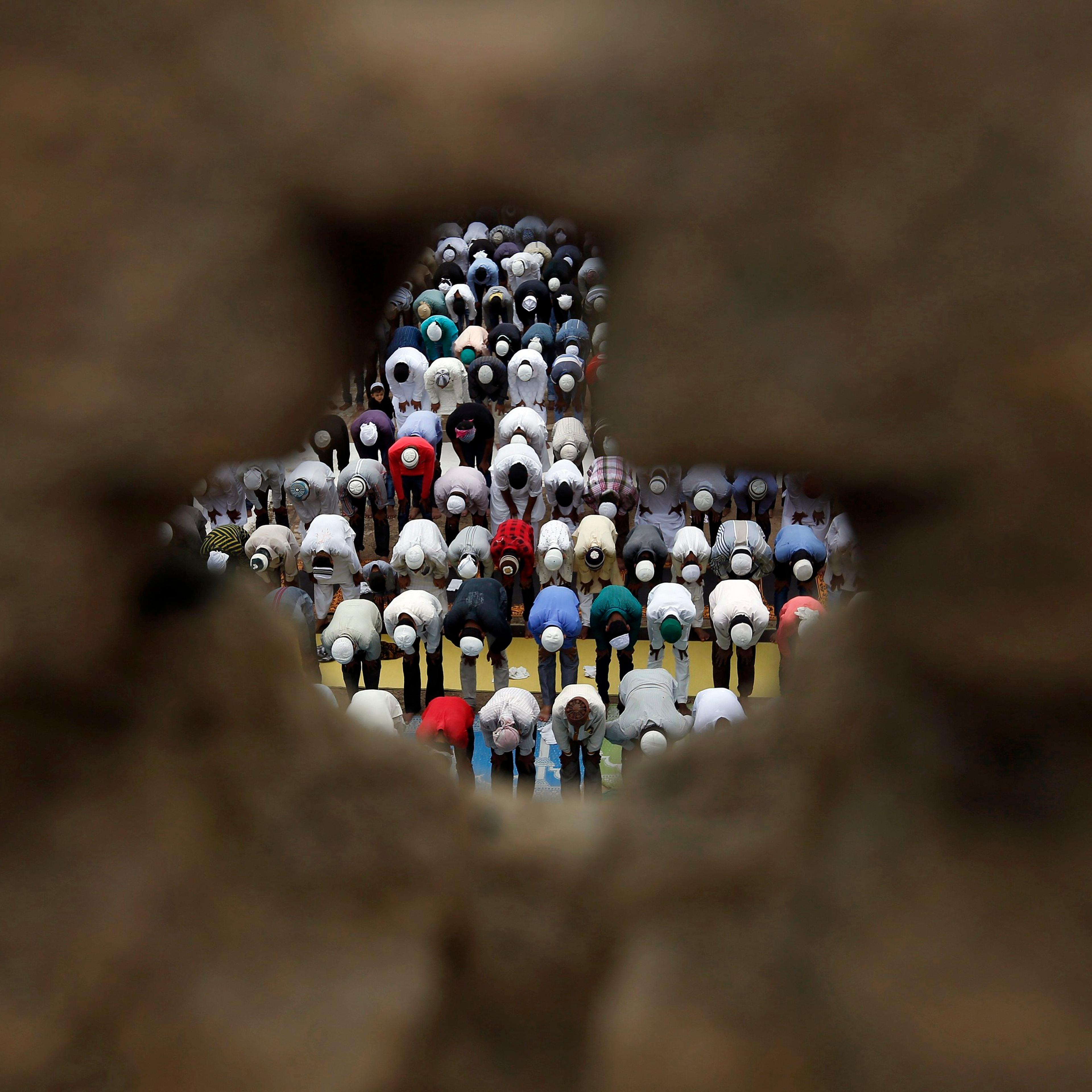 Muslims offer Friday prayers during the holy fasting month of Ramadan at a mosque in the western Indian city of Ahmedabad