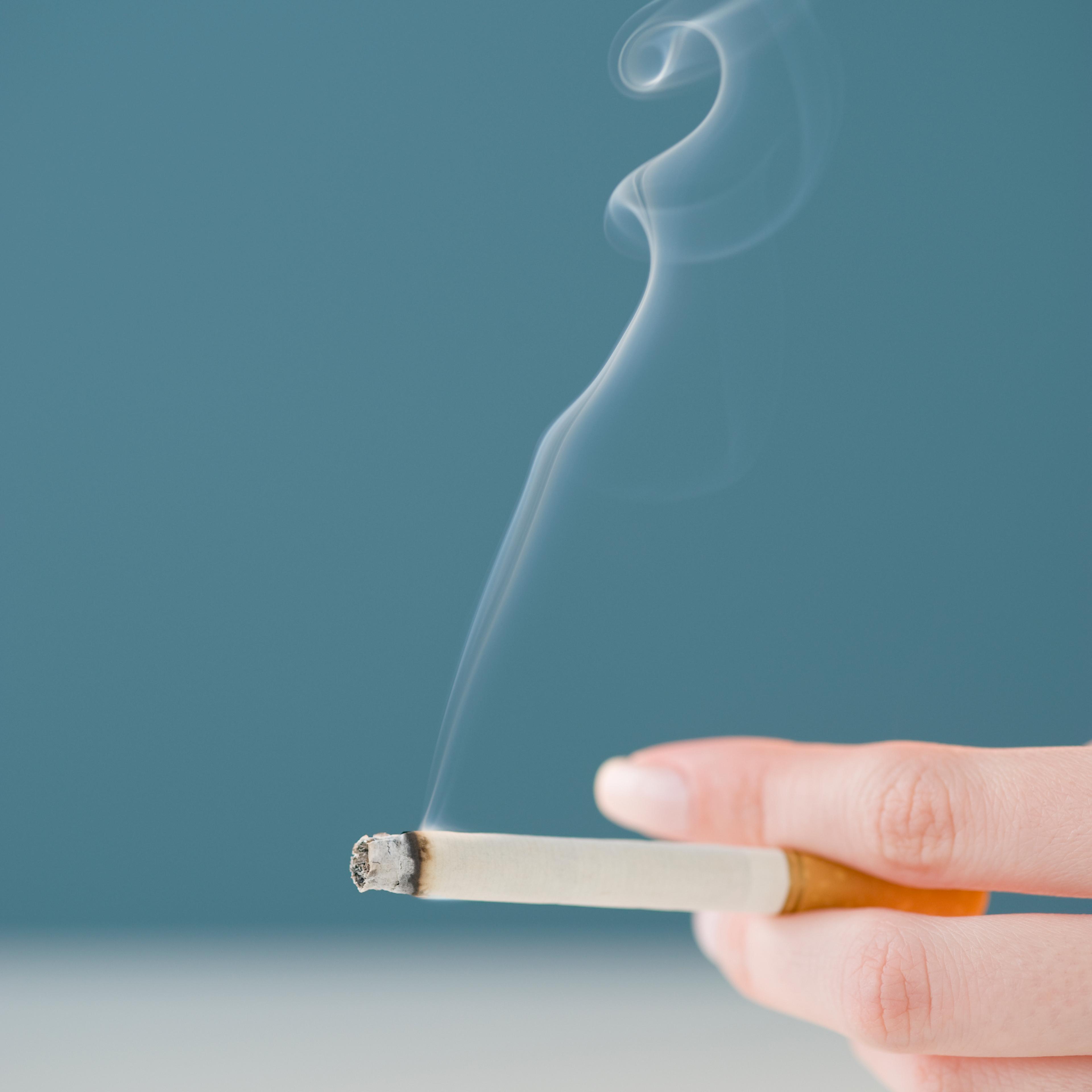 smoking lit cigarette