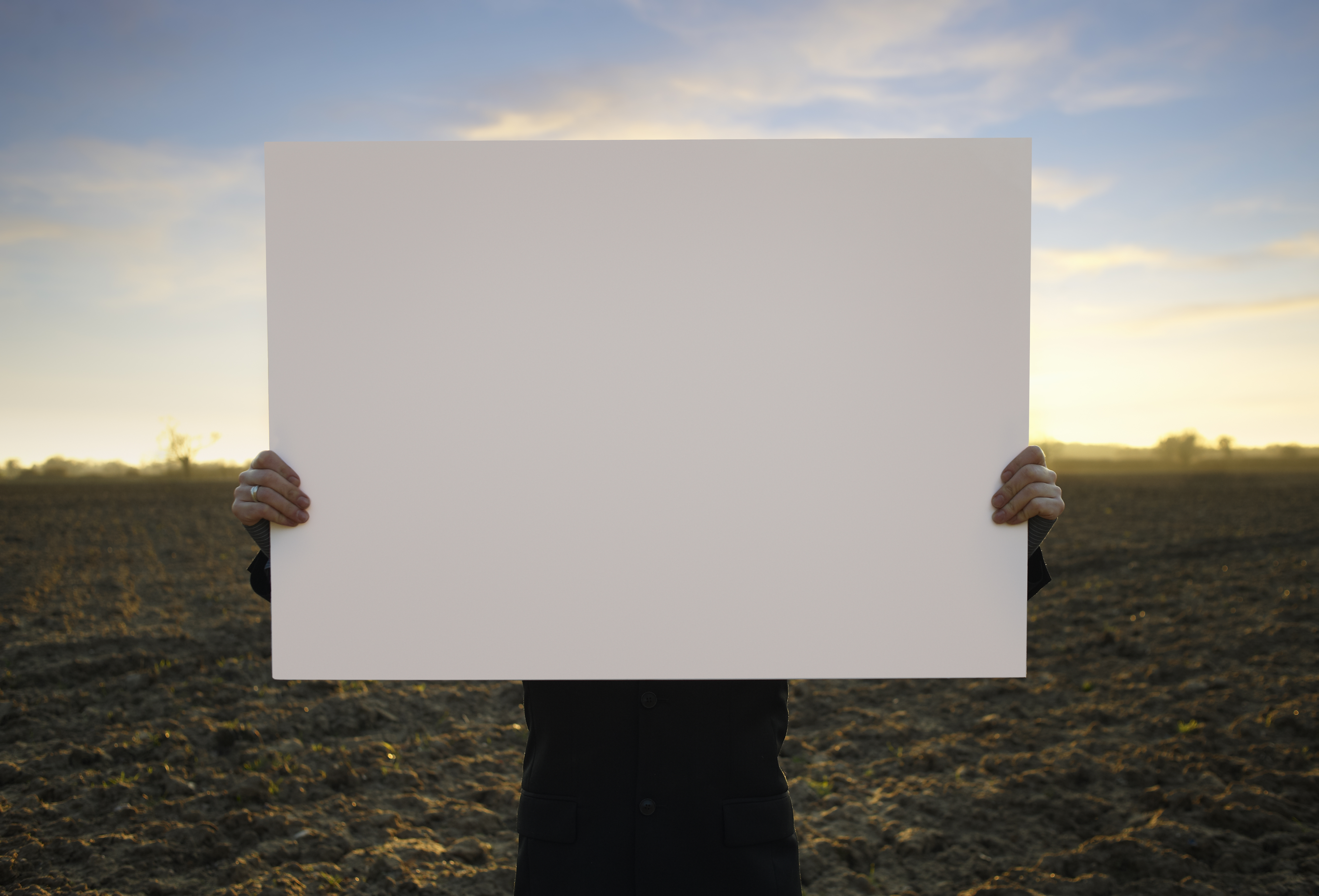 holding-blank-sign