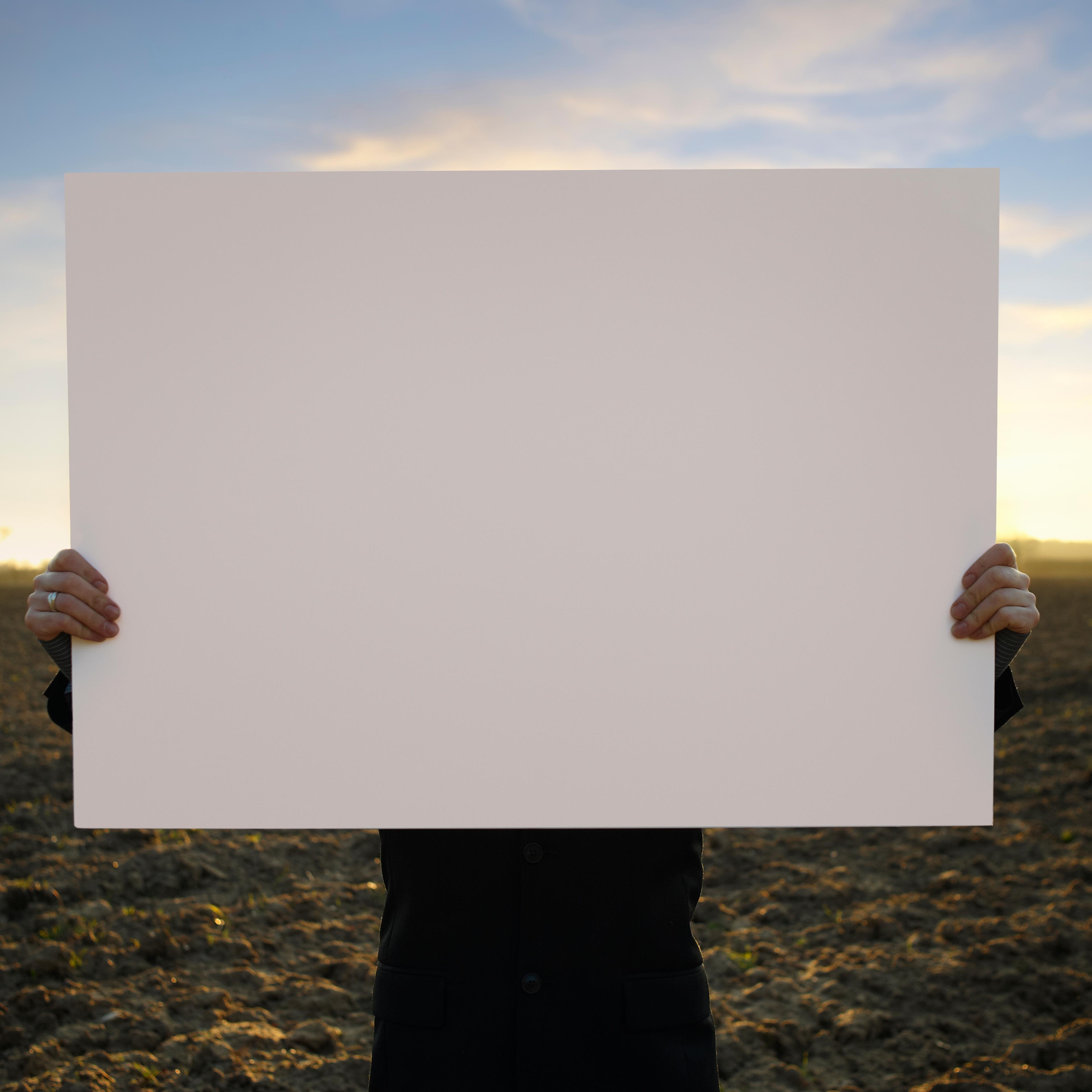 holding-blank-sign