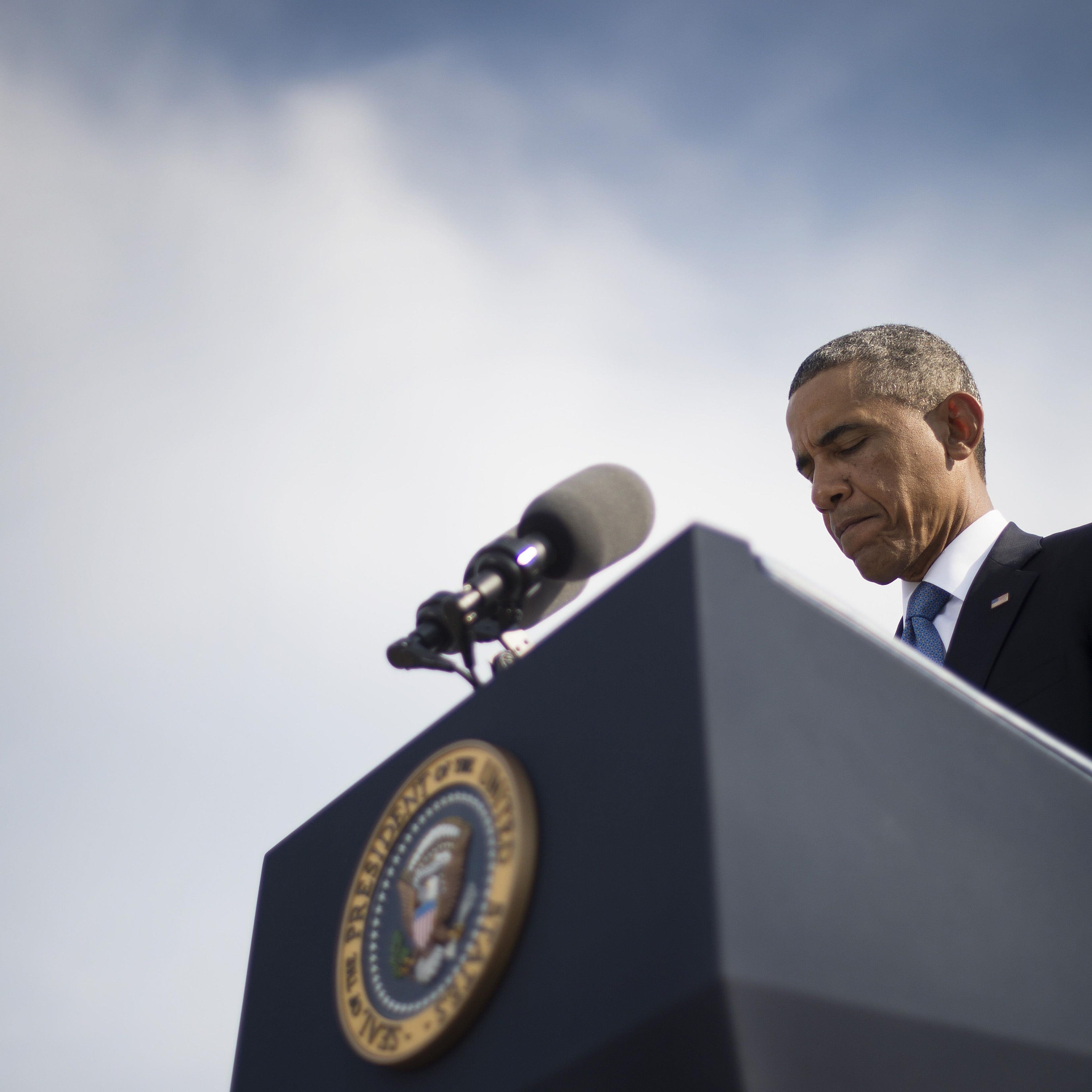 President Barack Obama speaks at the Pentagon in Washington, DC, September 11, 2014, during a ceremony marking the 13th anniversary of the 9/11 attacks on the United States.