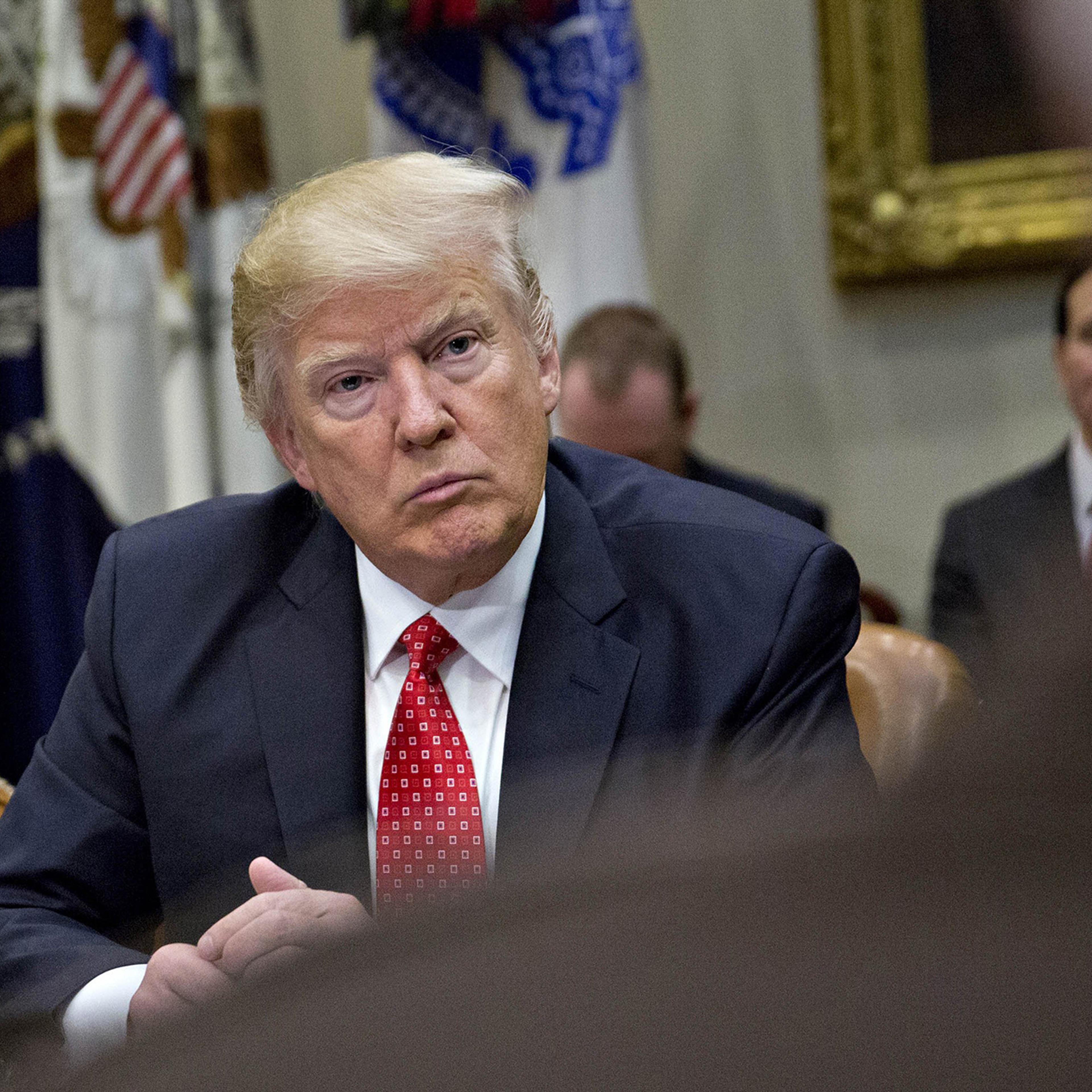 President Donald Trump listens during a listening session in the Roosevelt Room of the White House in Washington, on Feb. 7, 2017.