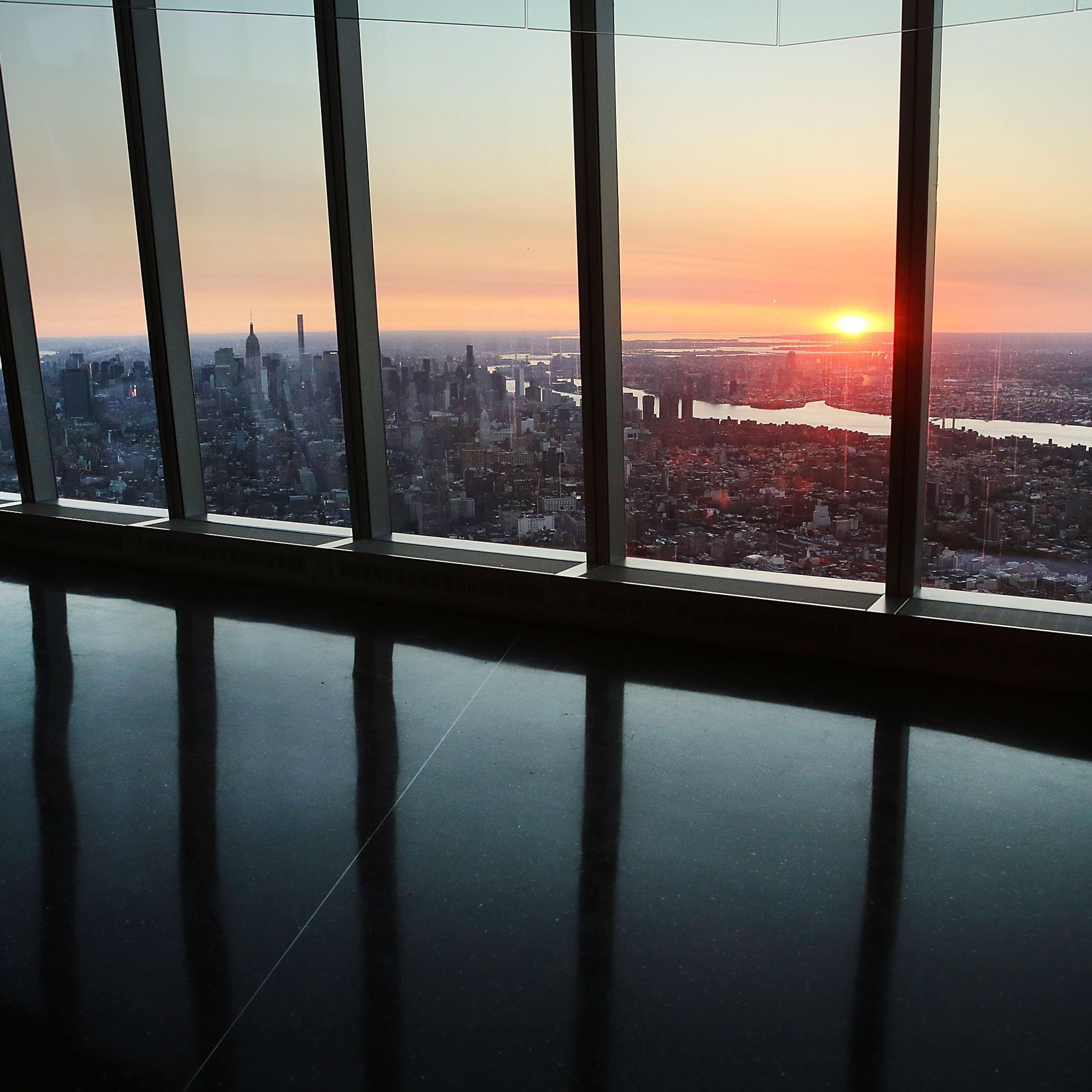 Manhattan is viewed at dawn from the newly built One World Observatory at One World Trade Center on the day it opens to the public on May 29, 2015 in New York City.