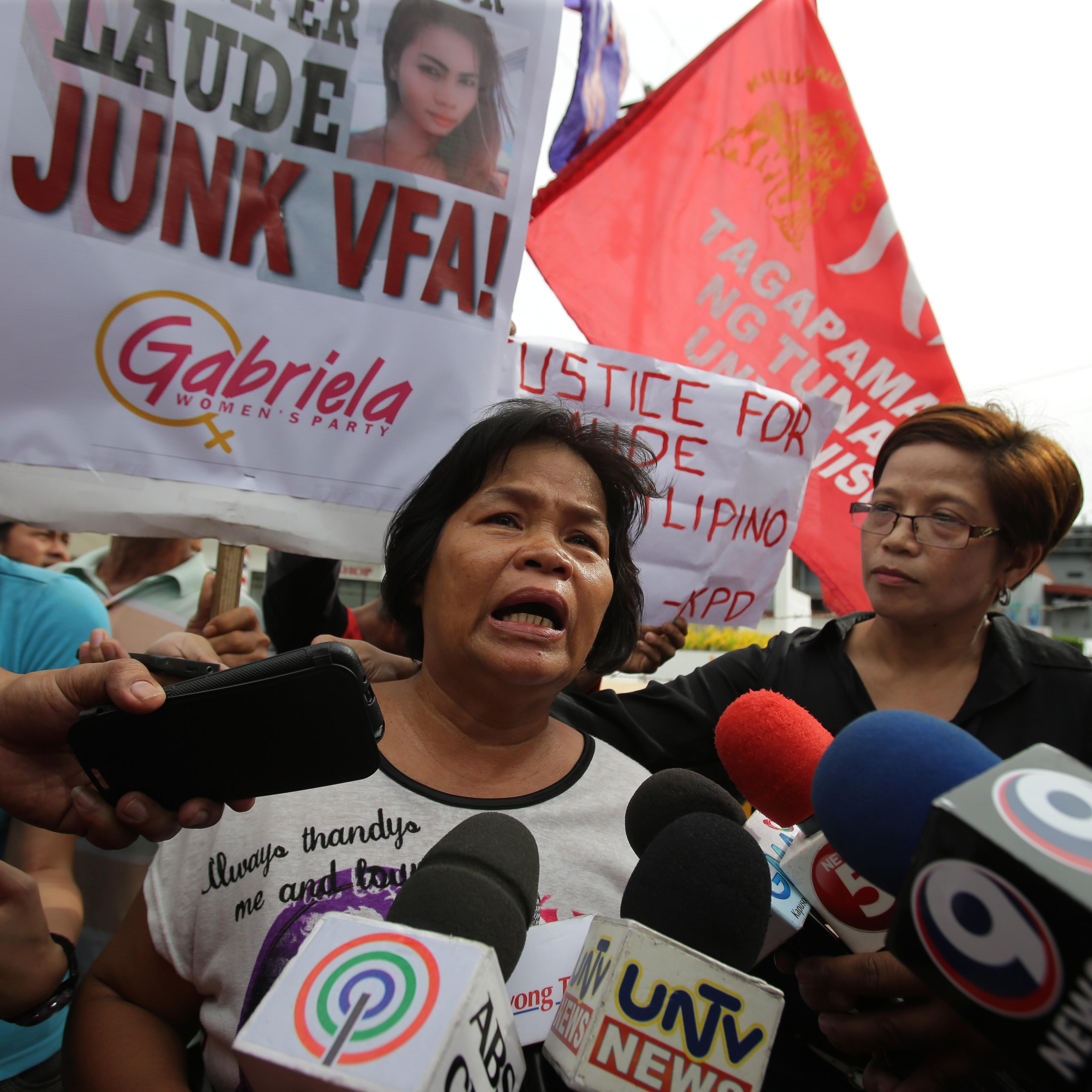 CORRECTION Philippines US Killing