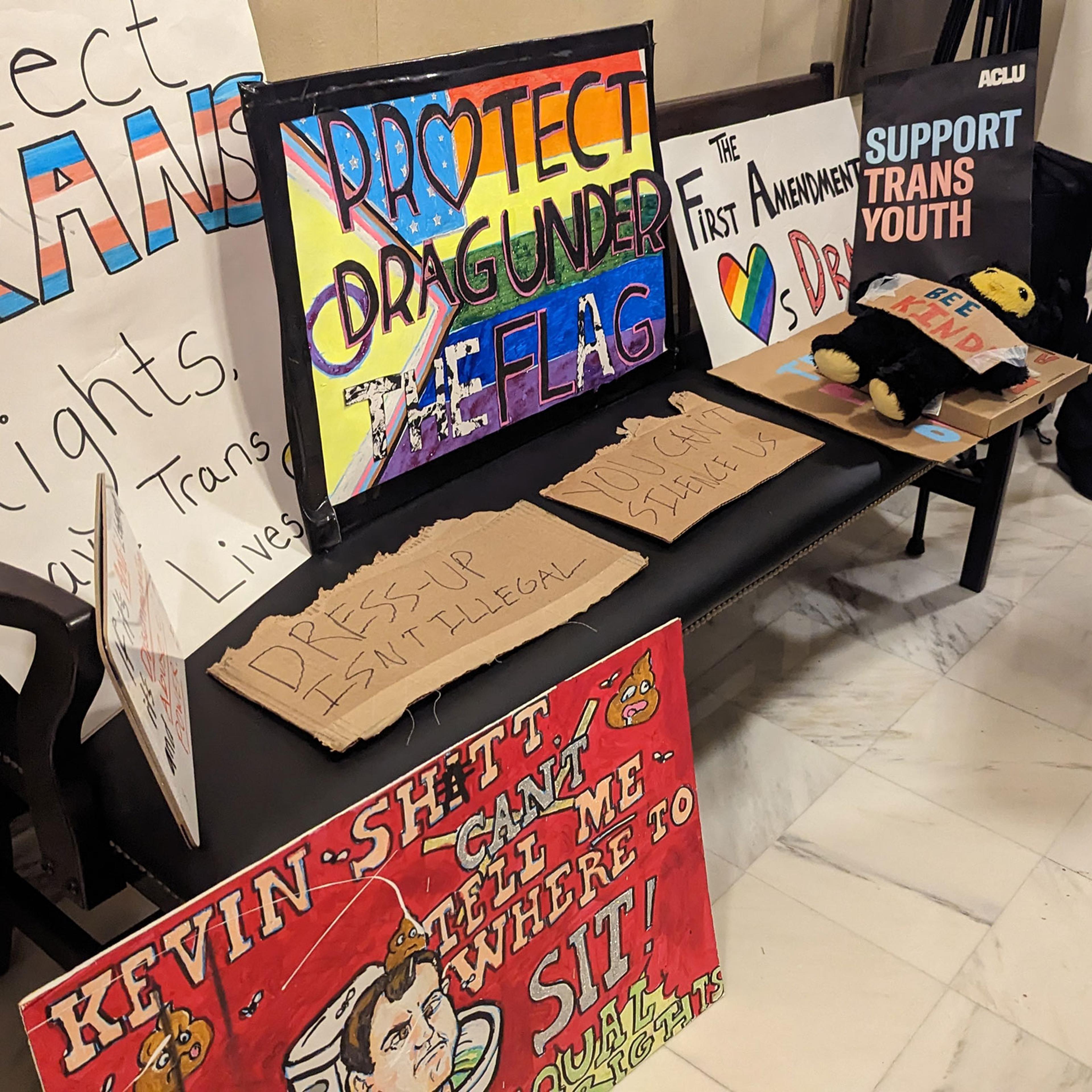 Posters made in support of drag performers and transgender rights are set up in the Oklahoma Capitol building, in Oklahoma City, Okla. on Feb. 22, 2023.