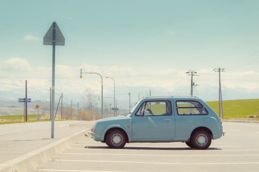 blue-car-parking-lot