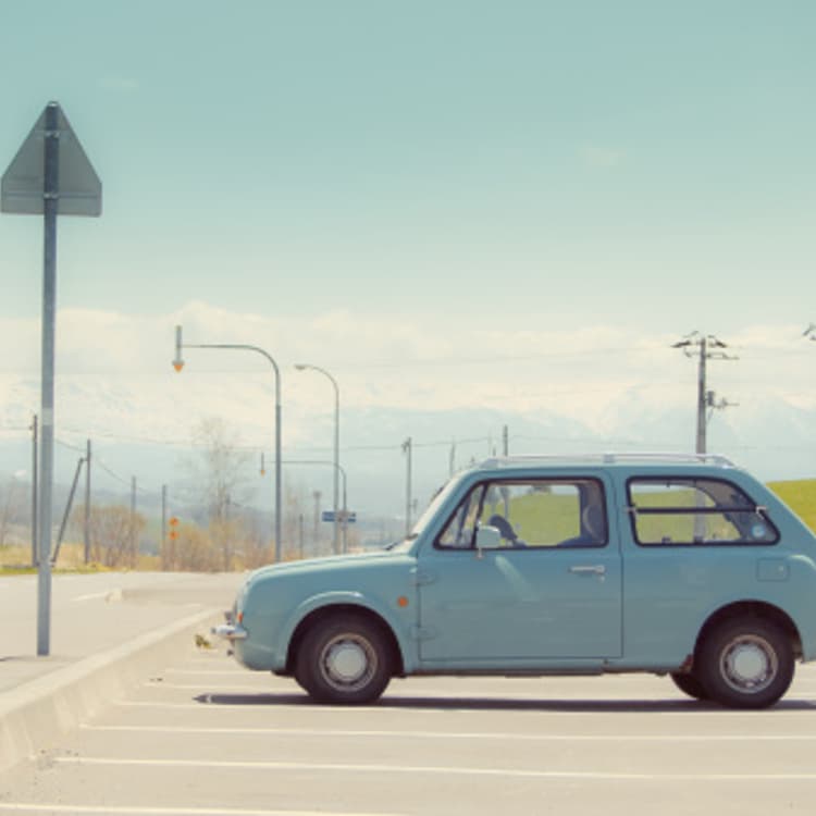 blue-car-parking-lot