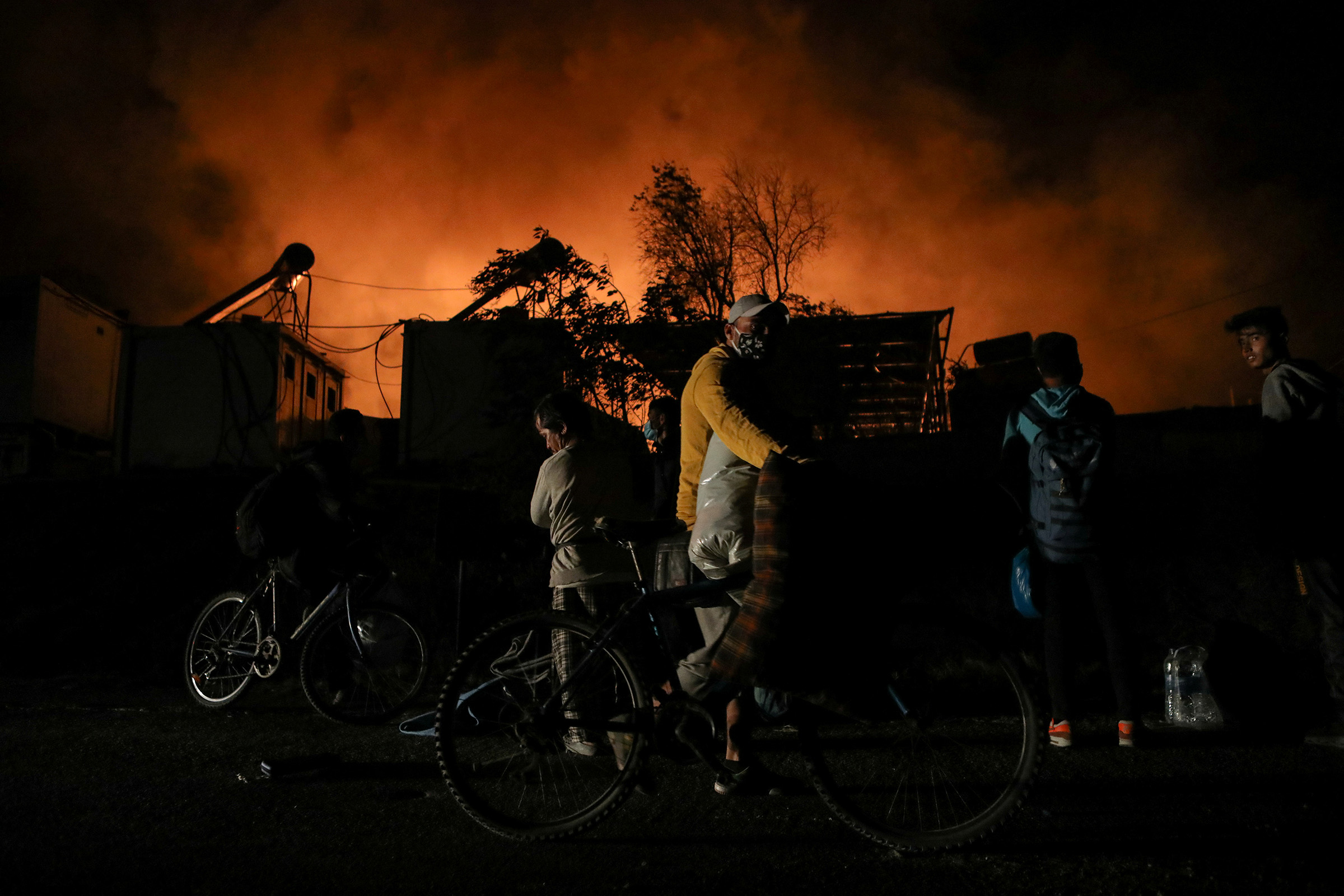 Fire burns at the Moria camp for refugees and migrants on the island of Lesbos