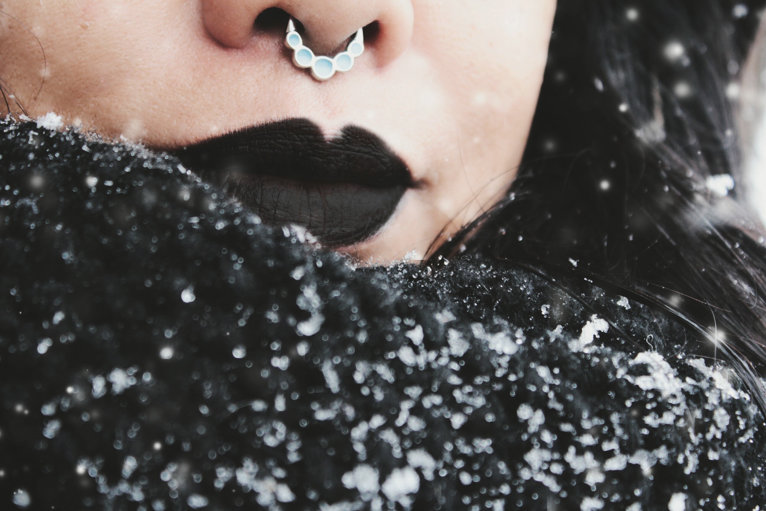 Cropped Image Of Woman With Black Lipstick During Snowfall