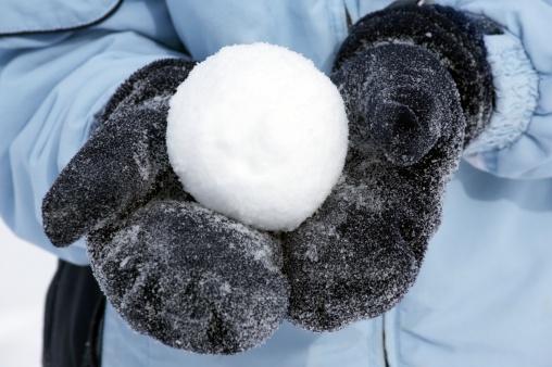 Person holding snowball