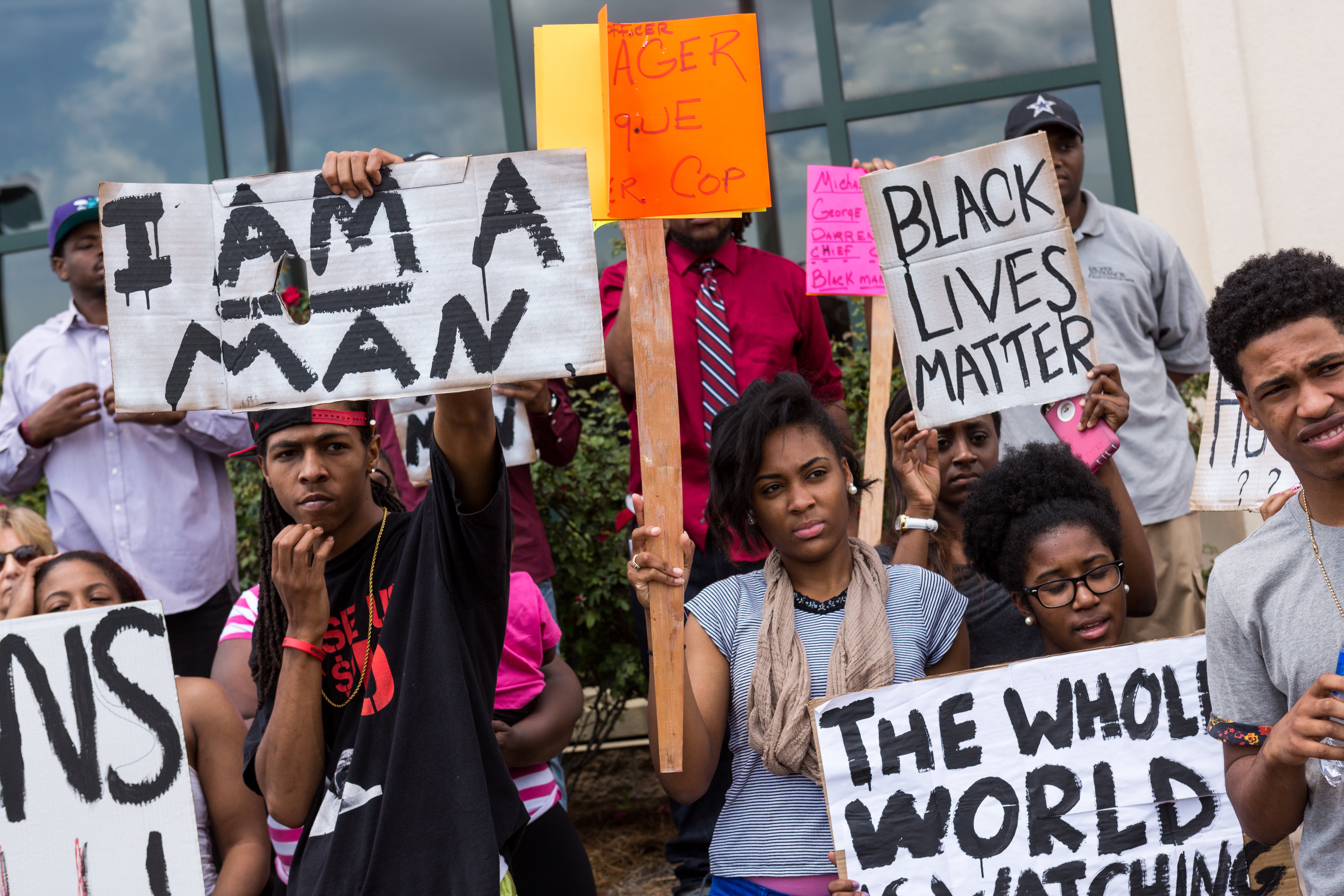 People participate in a rally to protest the death of Walter Scott after he was shot and killed by police officer Michael Slager, outside City Hall on April 8, 2015 in North Charleston, S.C.