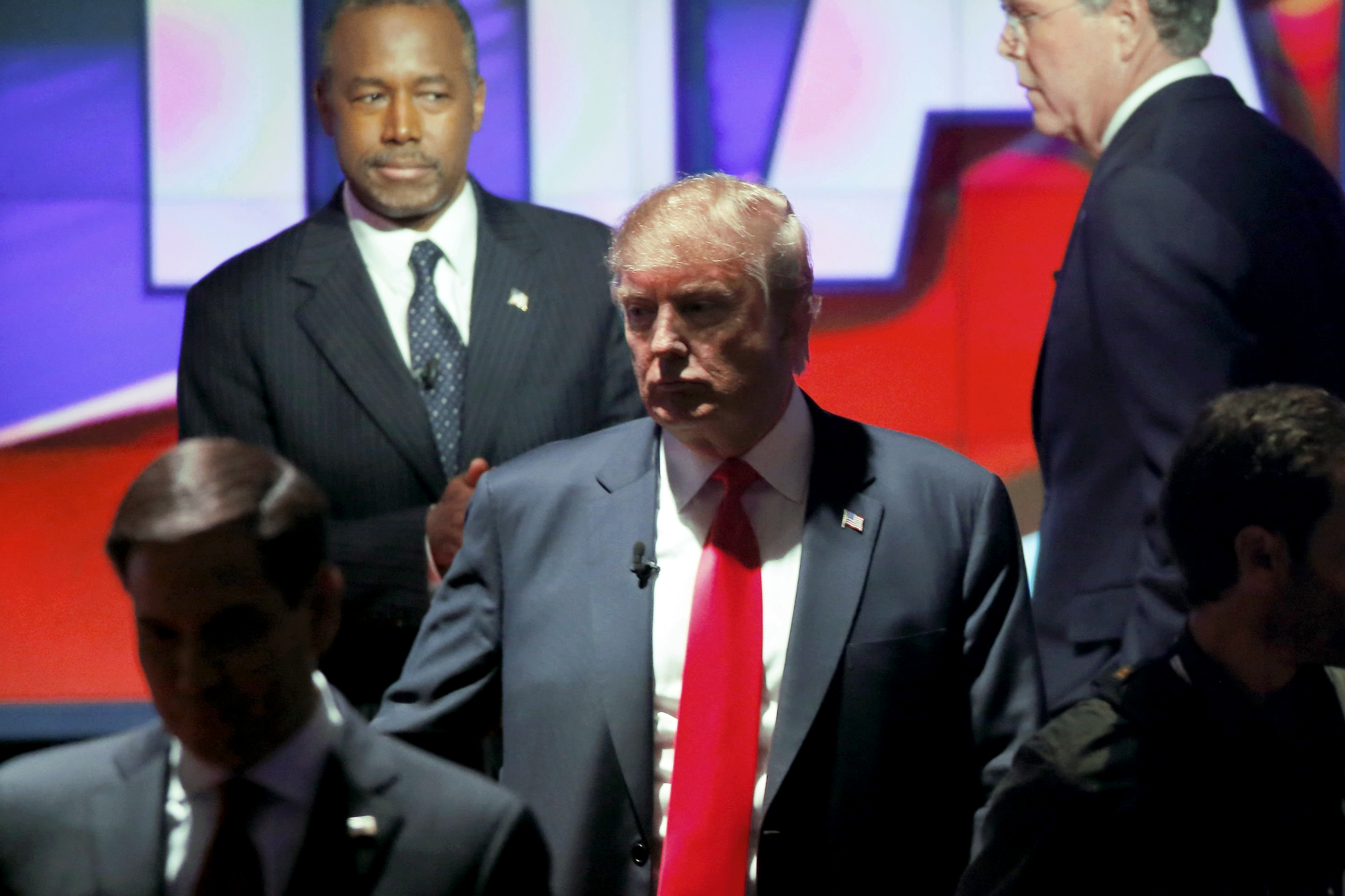Republican U.S. presidential candidate Donald Trump, center, with candidates, from bottom left, Sen. Marco Rubio, Dr. Ben Carson and former Gov. Jeb Bush at the Republican presidential debate in Las Vegas on Dec. 15, 2015.