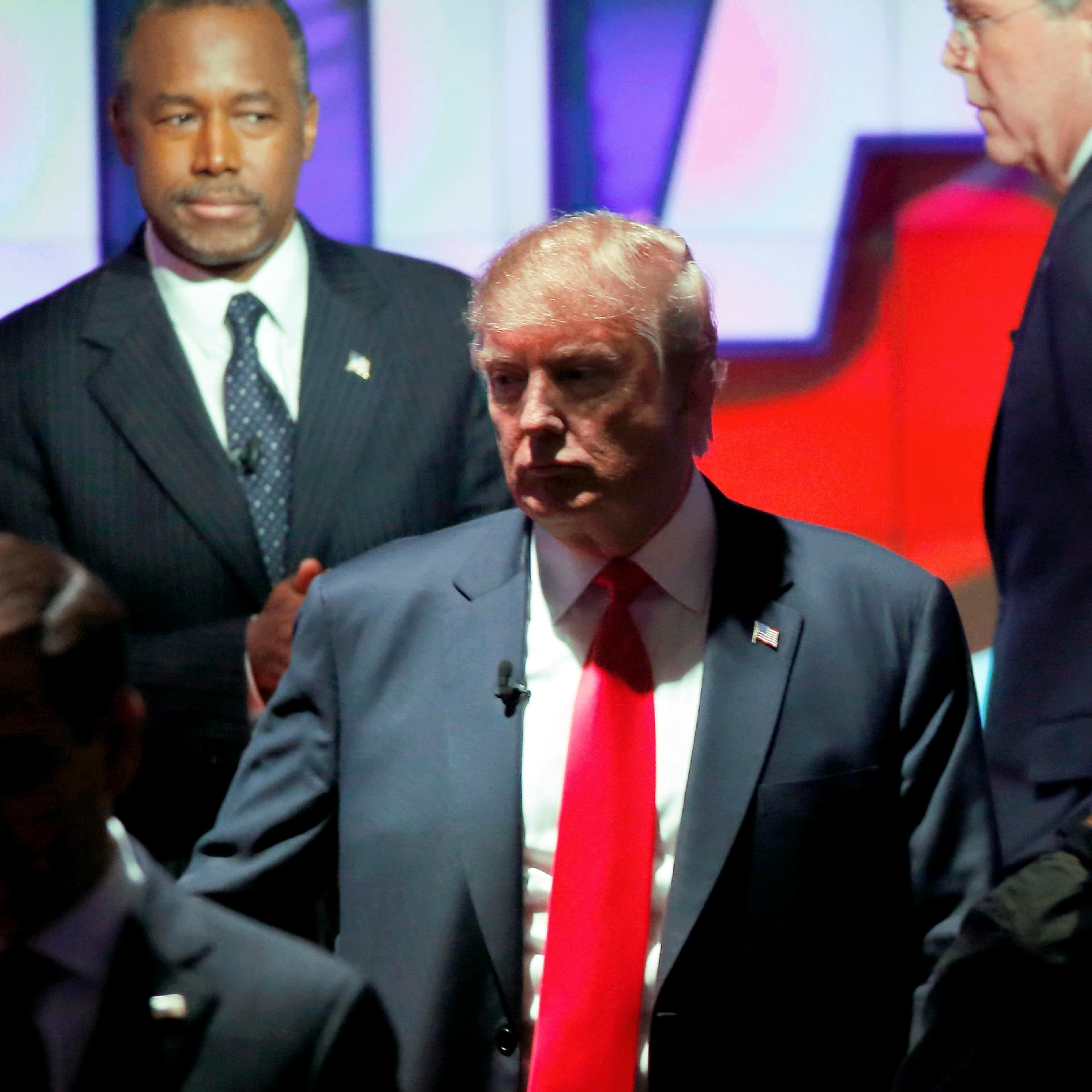 Republican U.S. presidential candidate Donald Trump, center, with candidates, from bottom left, Sen. Marco Rubio, Dr. Ben Carson and former Gov. Jeb Bush at the Republican presidential debate in Las Vegas on Dec. 15, 2015.