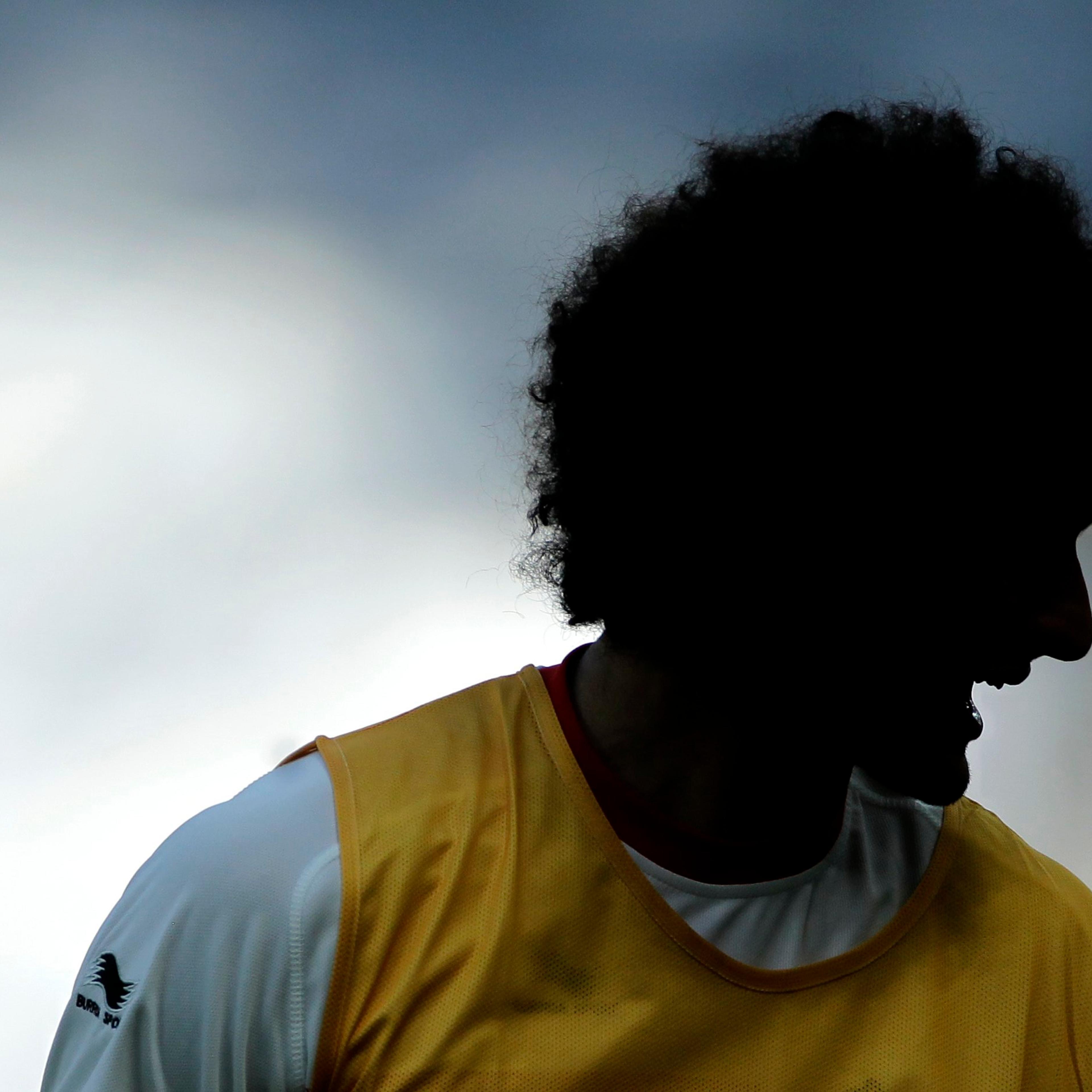 Belgiumís Marouane Fellaini laughs during a training session at the Mineirao Stadium in Belo Horizonte, Brazil on June 16, 2014.