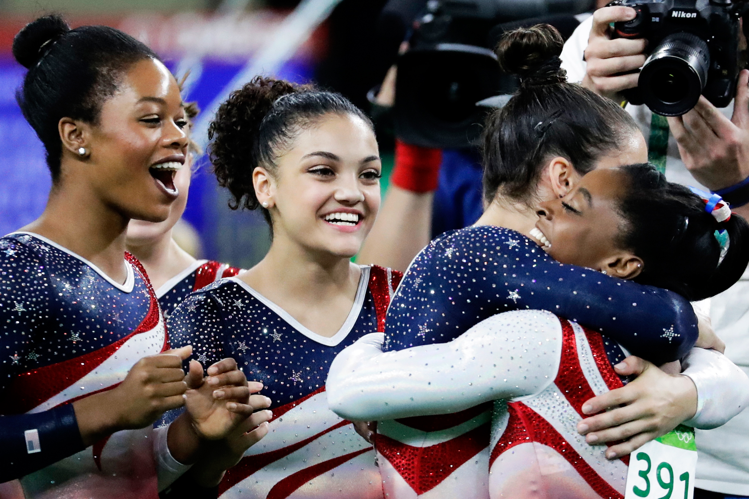 From left: U.S. gymnasts Gabrielle Douglas, Lauren Hernandez, Aly Raisman and Simone Biles celebrate at the end of the artistic gymnastics women's team final at the 2016 Summer Olympics in Rio de Janeiro, Brazil, on Aug. 9, 2016.