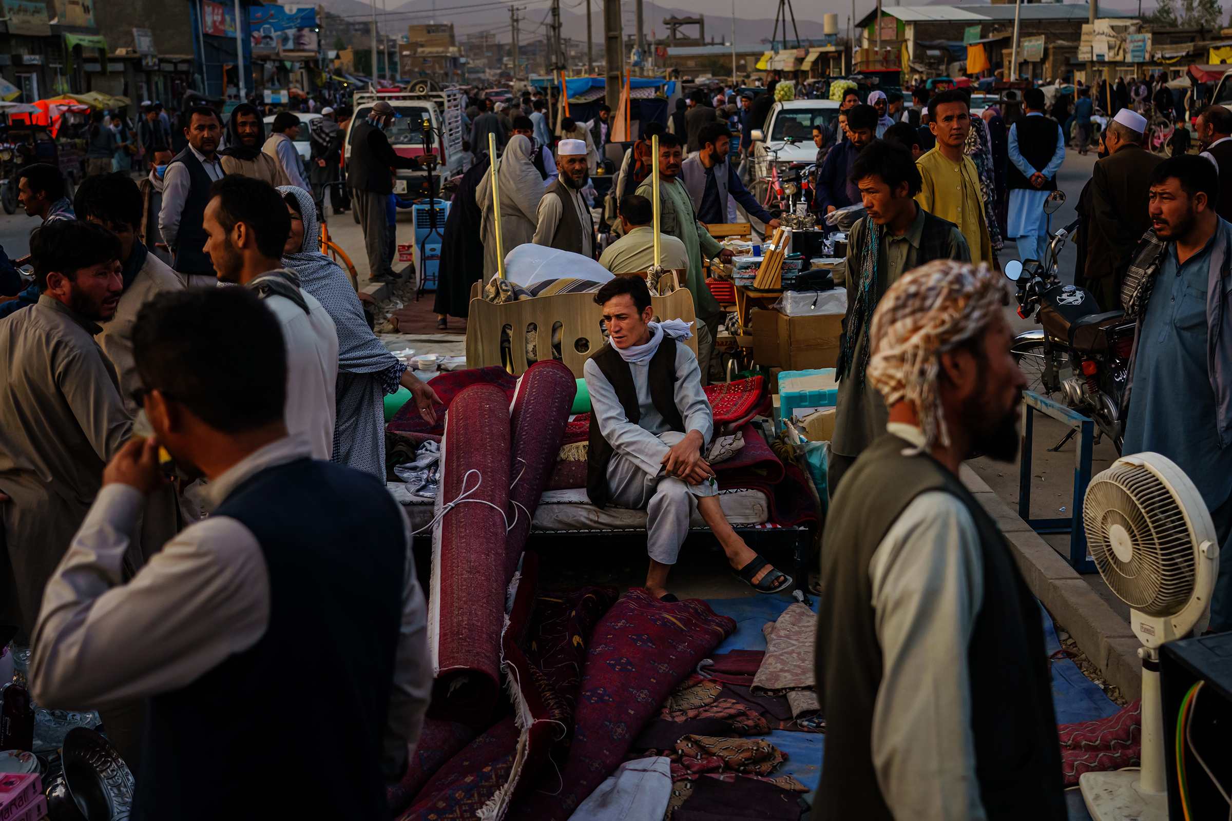 Afghans sell their personal belongings to raise money, citing unemployment, starvation and needing it leave the country, in Kabul on Sept. 20, 2021.