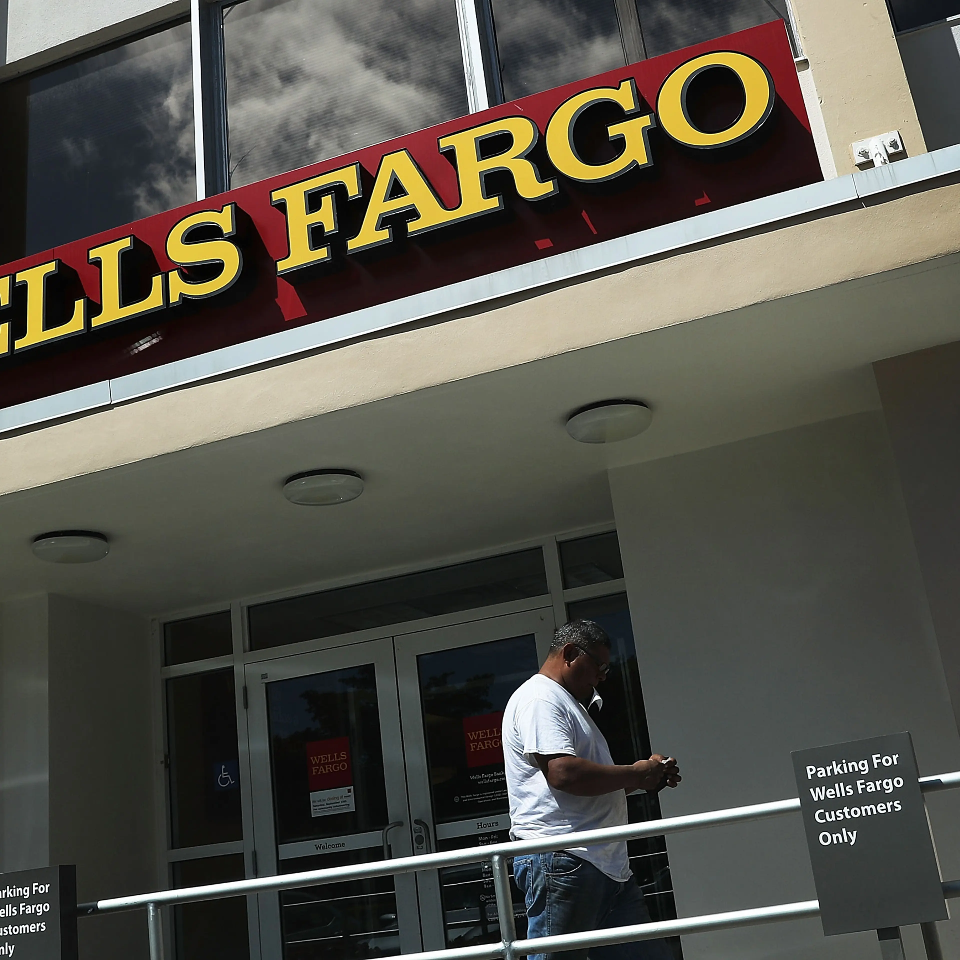 A Wells Fargo sign is seen on the exterior of one of their bank branches in Miami on September 9, 2016.
