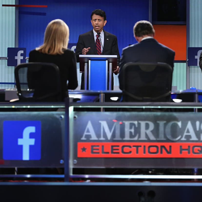 Republican presidential candidates (L-R) Sen. Lindsey Graham (R-SC), Louisiana Gov. Bobby Jindal and Rick Perry participate in a presidential pre-debate forum hosted by FOX News and Facebook at the Quicken Loans Arena August 6, 2015 in Cleveland, Ohio.