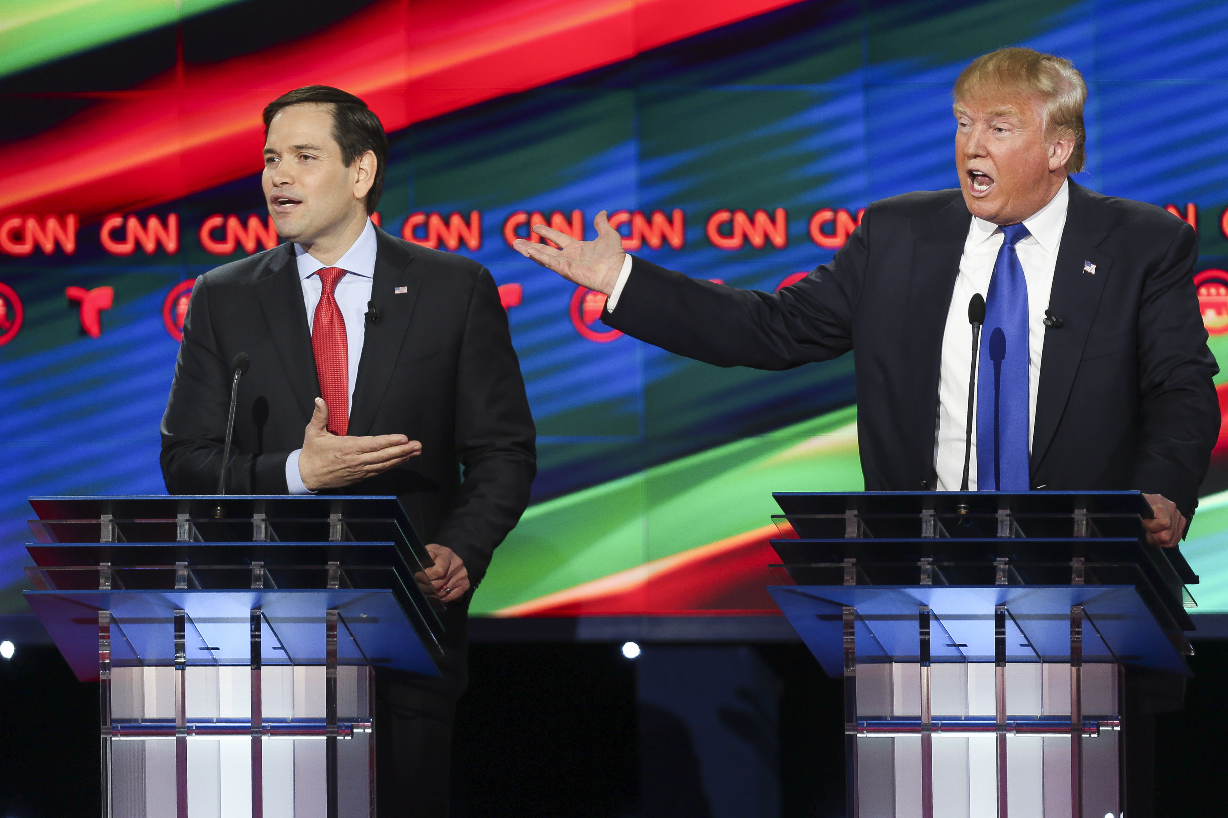 Donald Trump, president and chief executive of Trump Organization Inc. and 2016 Republican presidential candidate, right, and Senator Marco Rubio, a Republican from Florida and 2016 presidential candidate, speak during the Republican presidential primary