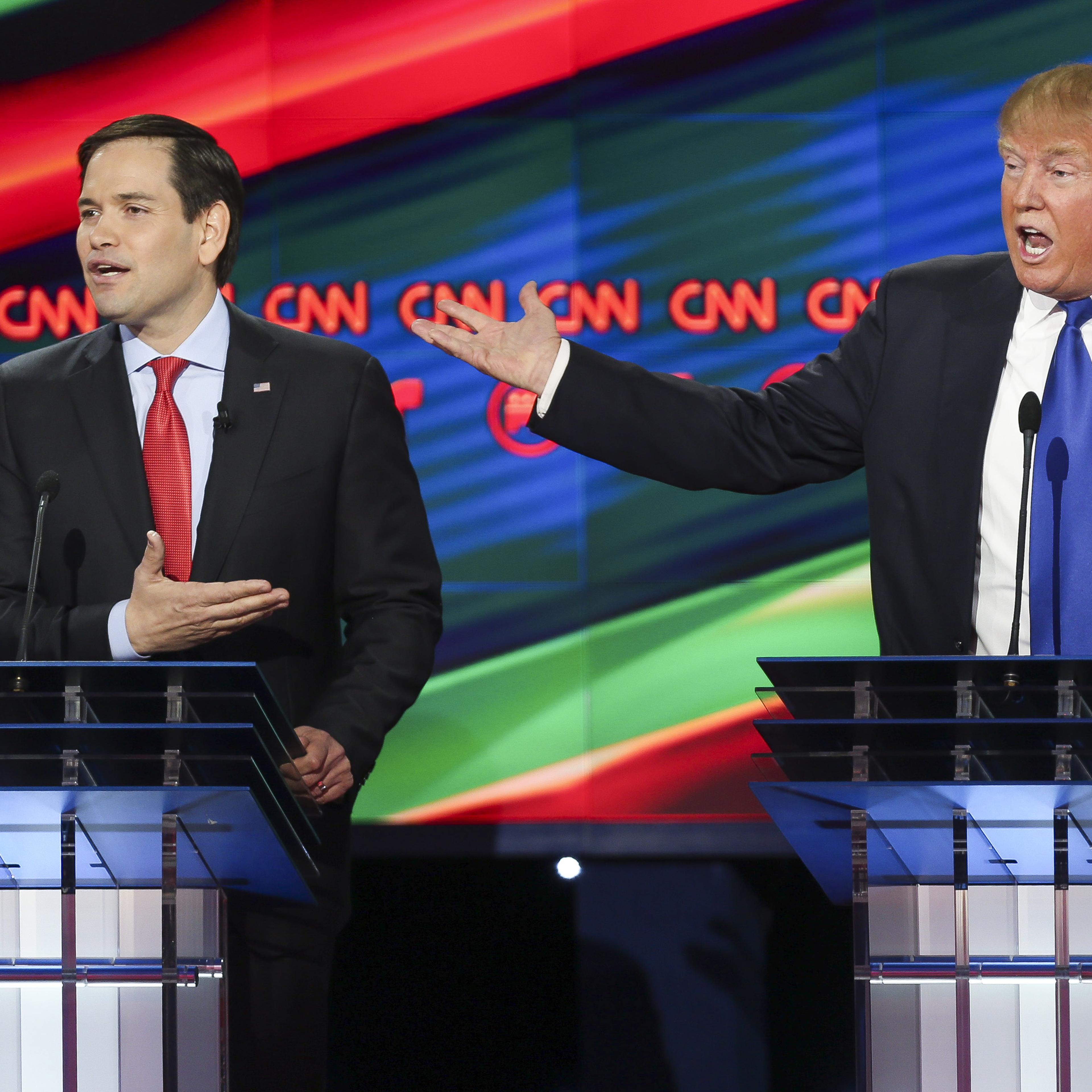 Donald Trump, president and chief executive of Trump Organization Inc. and 2016 Republican presidential candidate, right, and Senator Marco Rubio, a Republican from Florida and 2016 presidential candidate, speak during the Republican presidential primary