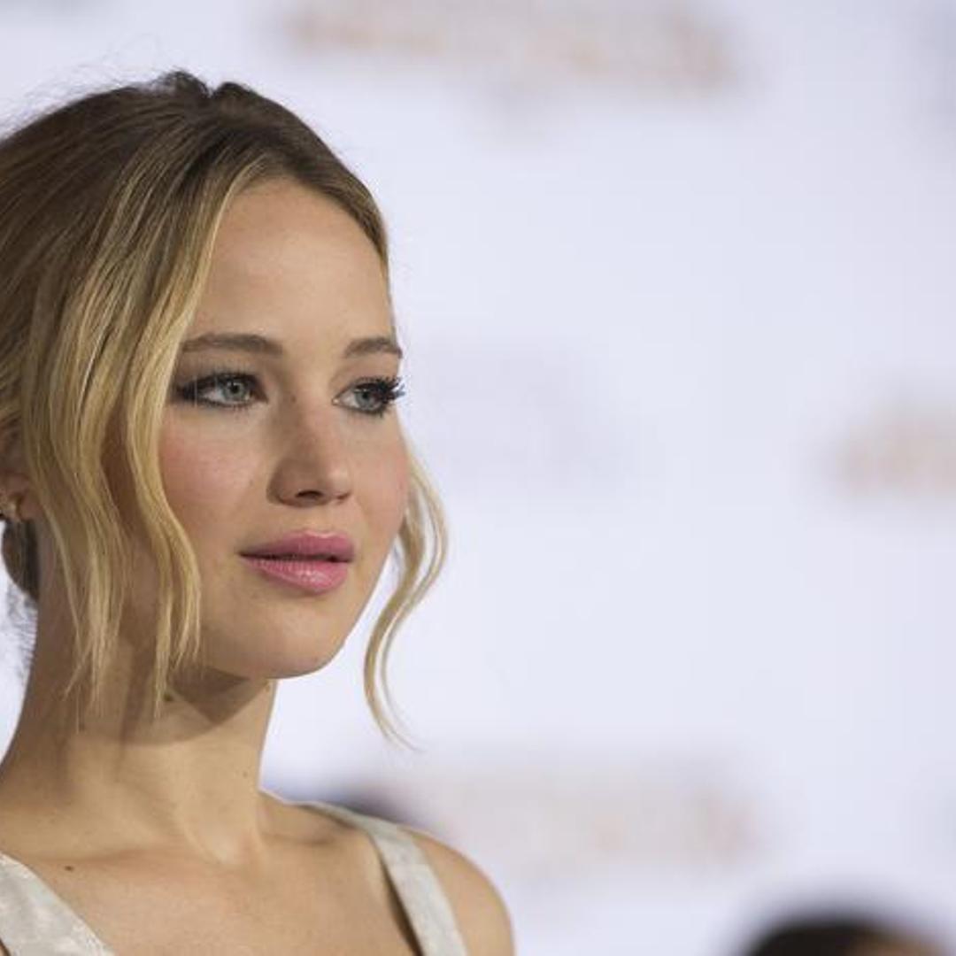 Cast member Lawrence poses at the premiere of "The Hunger Games: Mockingjay - Part 1" in Los Angeles