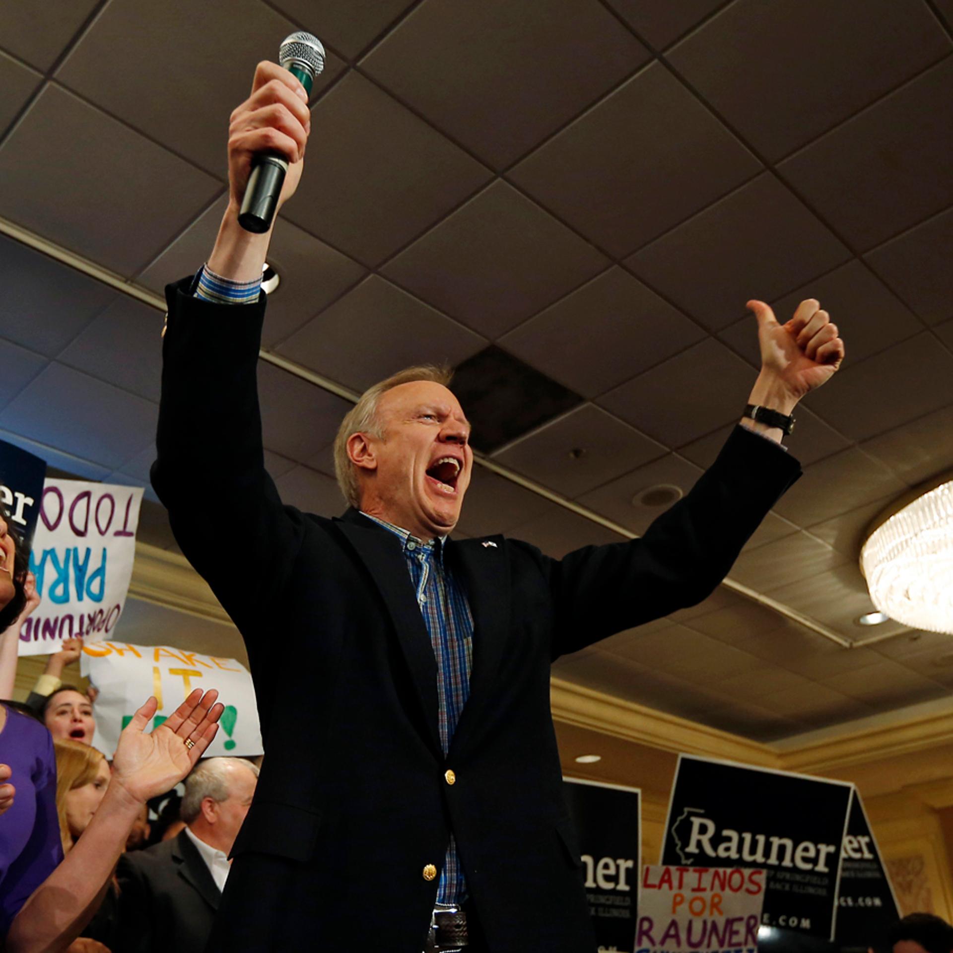 Republican candidate for Illinois Governor Bruce Rauner celebrates with his wife Diana after winning the nomination in the Illinois Primary in Chicago