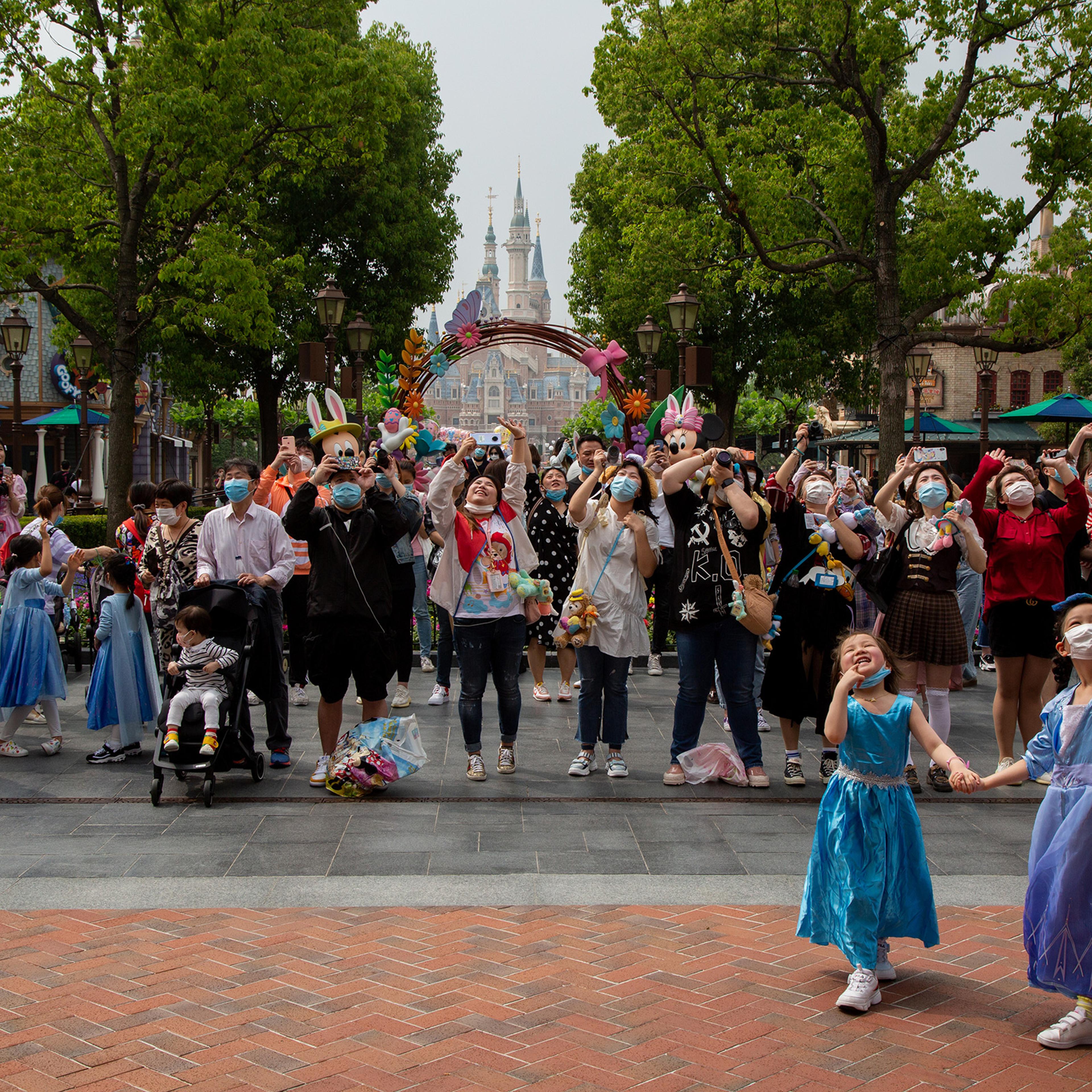Visitors inside Shanghai Disneyland on May 11, the day it reopened