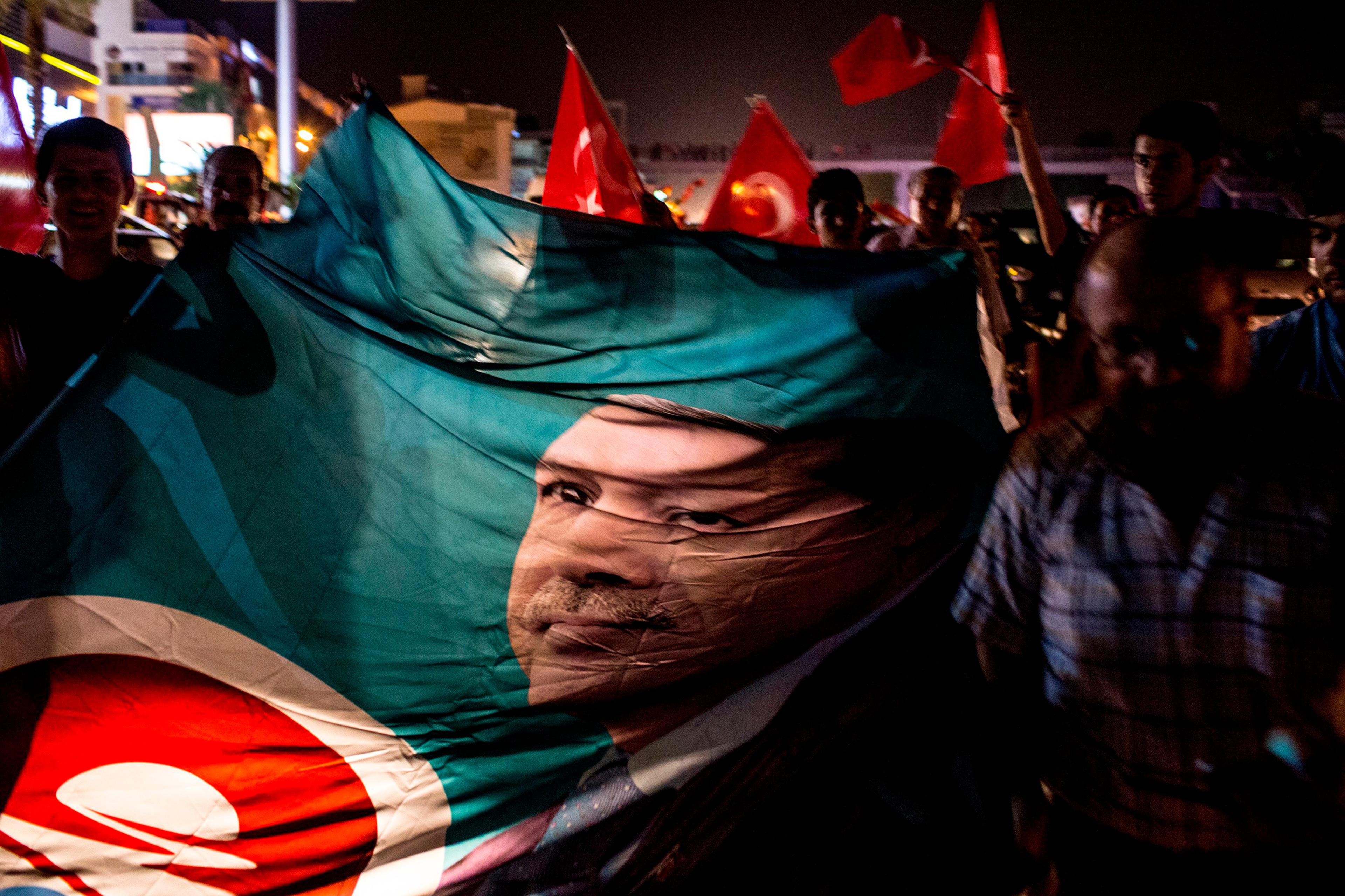 People take to the street in support of President Recep Tayyip Erdogan in Antalya, Turkey, on July 16, 2016.