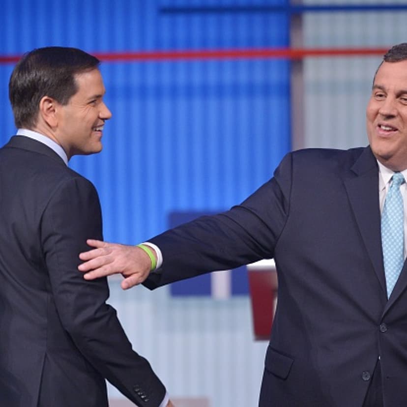 New Jersey Governor Chris Christie (R) chats with Florida Senator Marco Rubio (L) following the prime time Republican presidential debate on August 6, 2015 at the Quicken Loans Arena in Cleveland, Ohio.