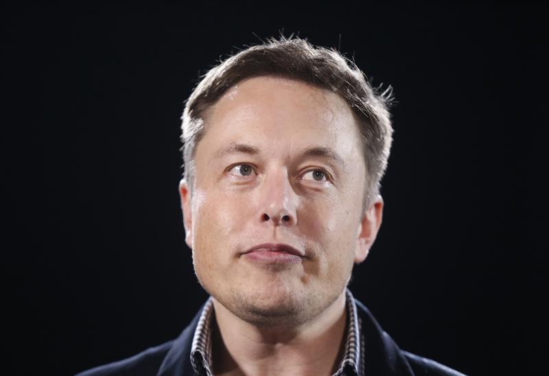 Tesla Motors Inc CEO Elon Musk unveils a new all-wheel-drive version of the Model S car in Hawthorne, California