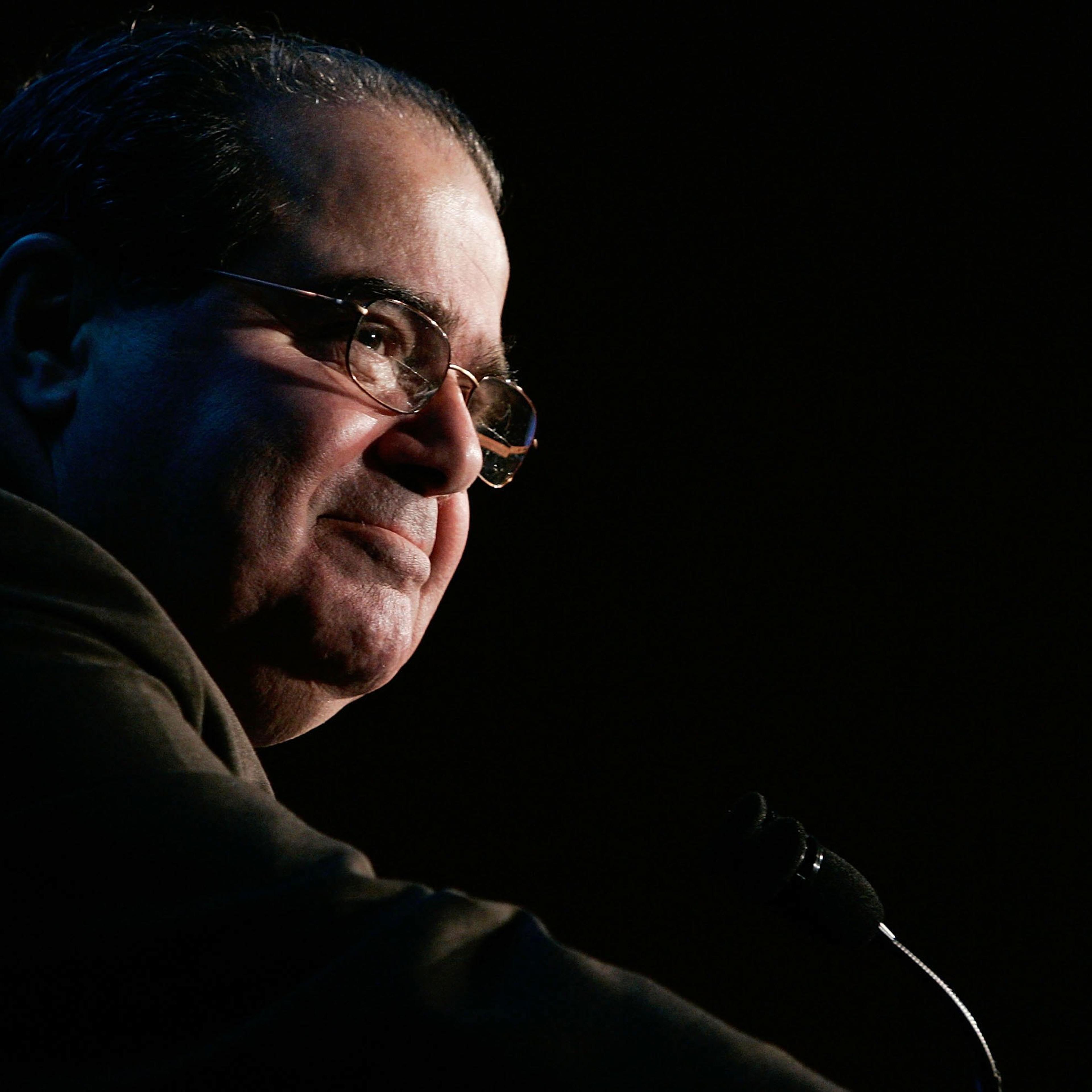 This Dec. 13, 2006 photo shows Supreme Court Associate Justice Antonin Scalia during an address at a Northern Virginia Technology Council (NVTC) breakfast in McLean, Va.